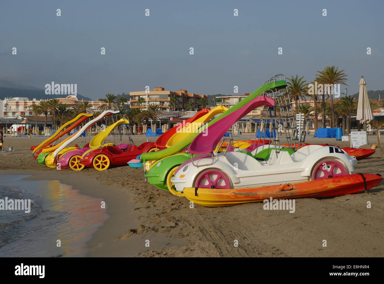 Early morning Arenal beach scene with pedal boats ready for hire, Javea