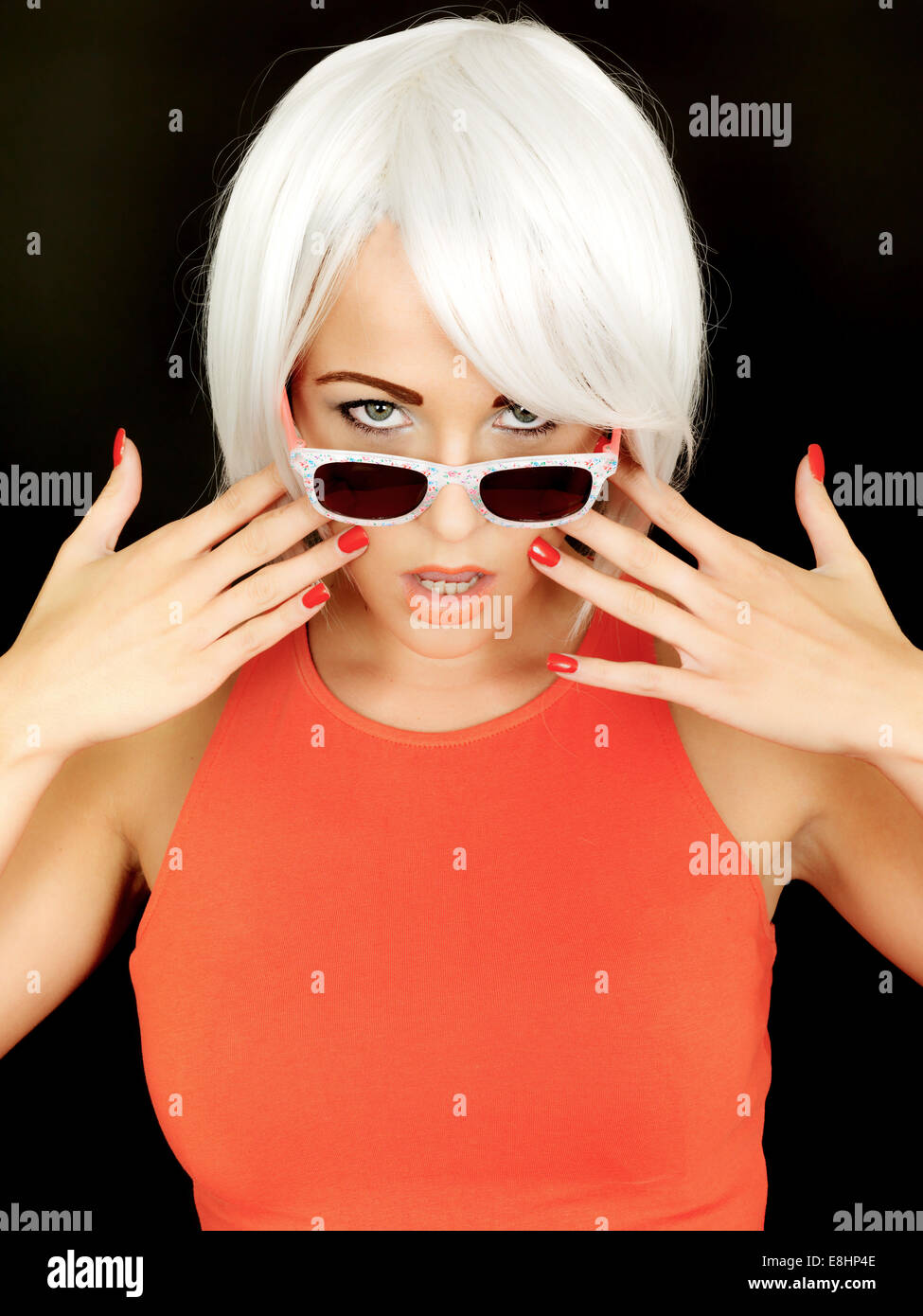 Attractive Young Woman Wearing Sunglasses Stock Photo - Alamy
