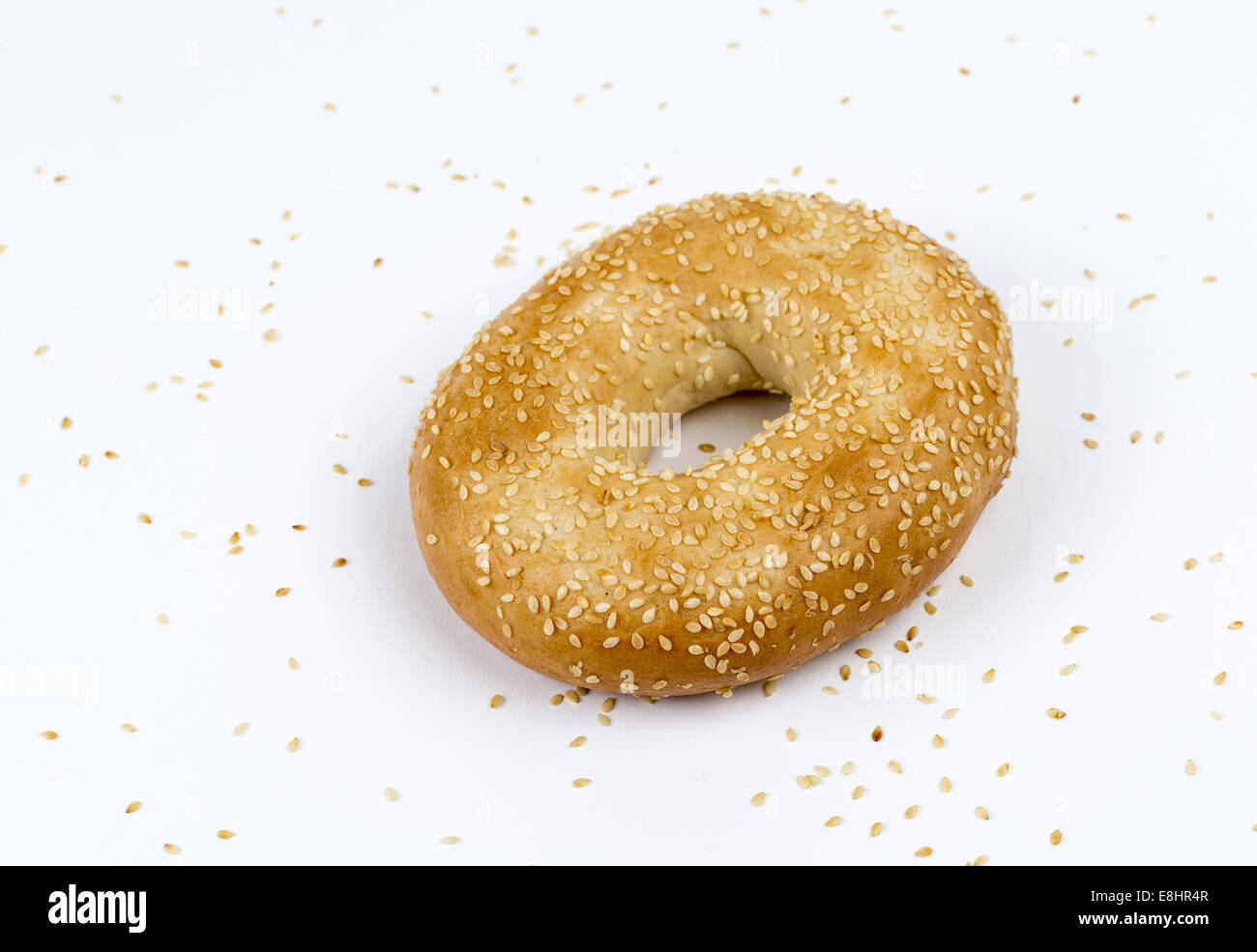 Sesame seed bagel surrounded by sesame seeds Stock Photo Alamy