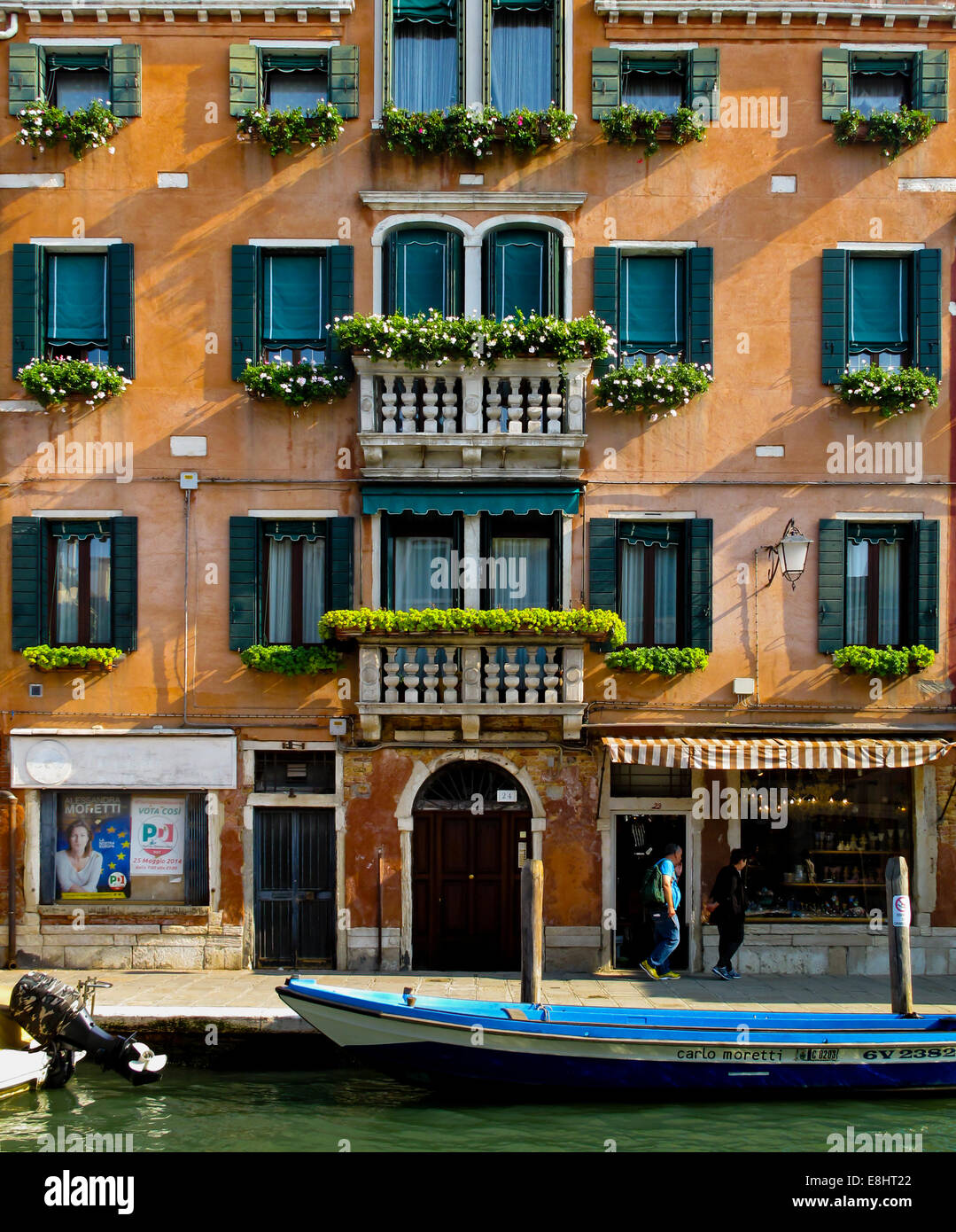 Traditional building next to a canal in Murano an island in the Lagoon at Venice or Laguna Veneto northern Italy Stock Photo