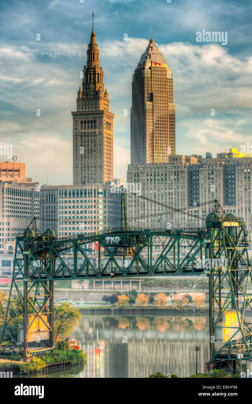 The Terminal Tower and Key Tower, lit by early morning light, dominate the skyline of Cleveland, Ohio. Stock Photo