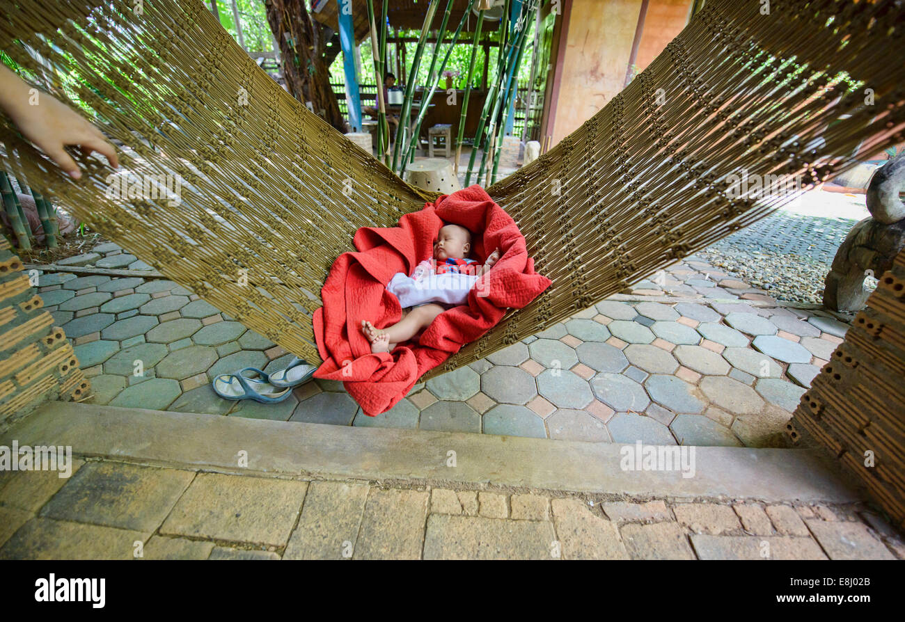 baby sleeping in a hammock in Chiang Mai, Thailand Stock Photo Alamy