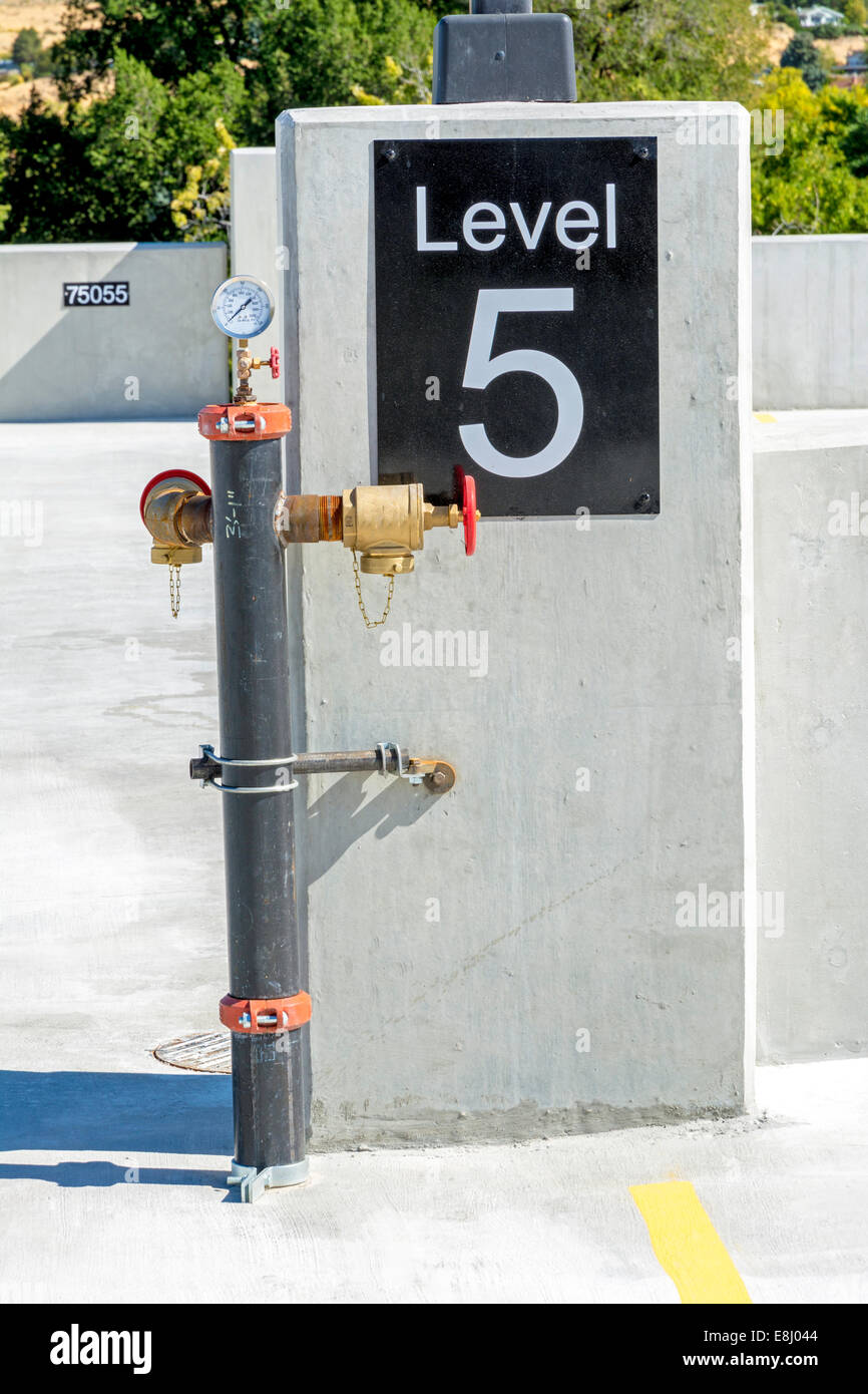 Fire suppression station in a parking garage Stock Photo Alamy