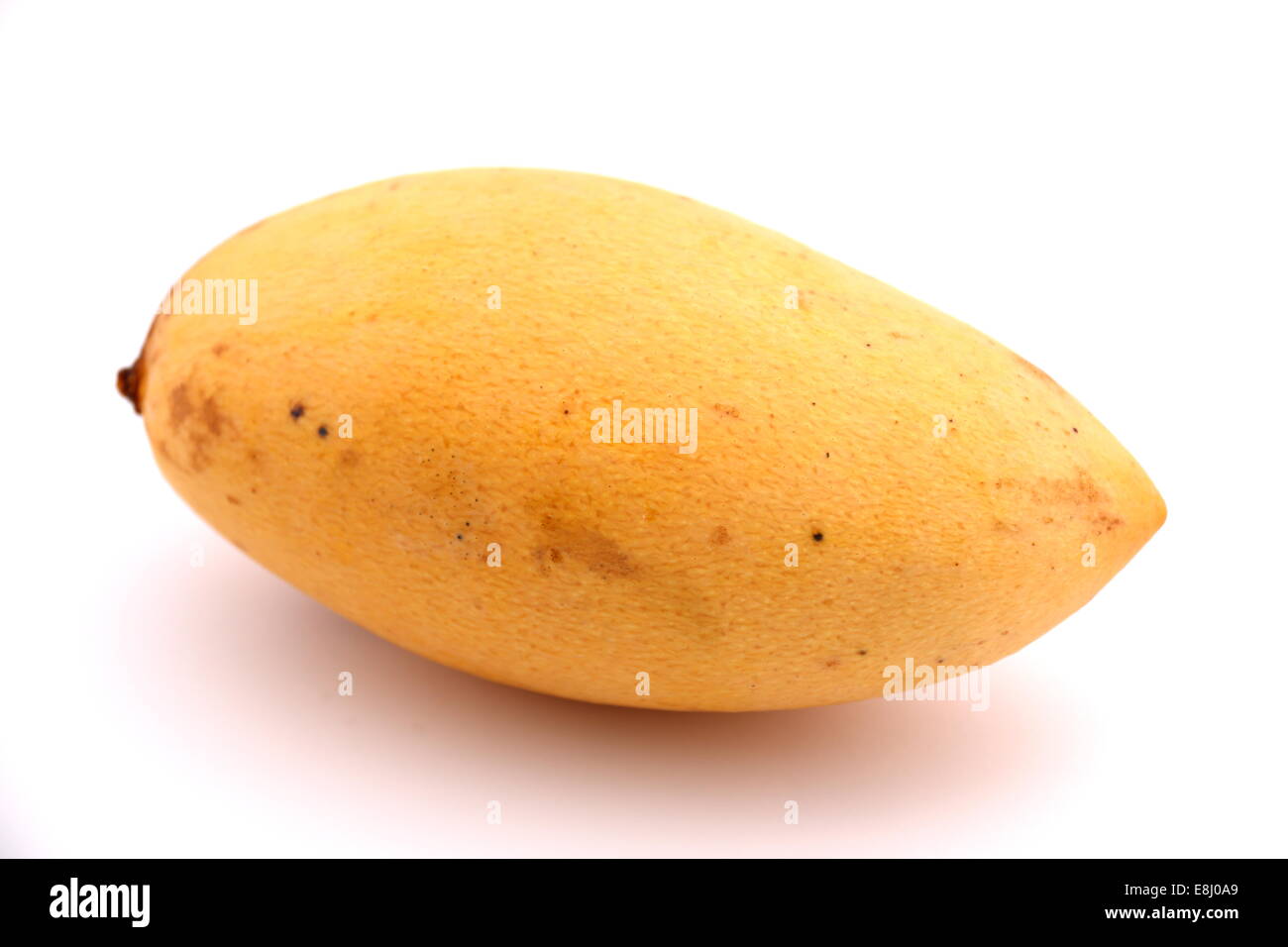 A Mango fruit isolated on white background Stock Photo - Alamy