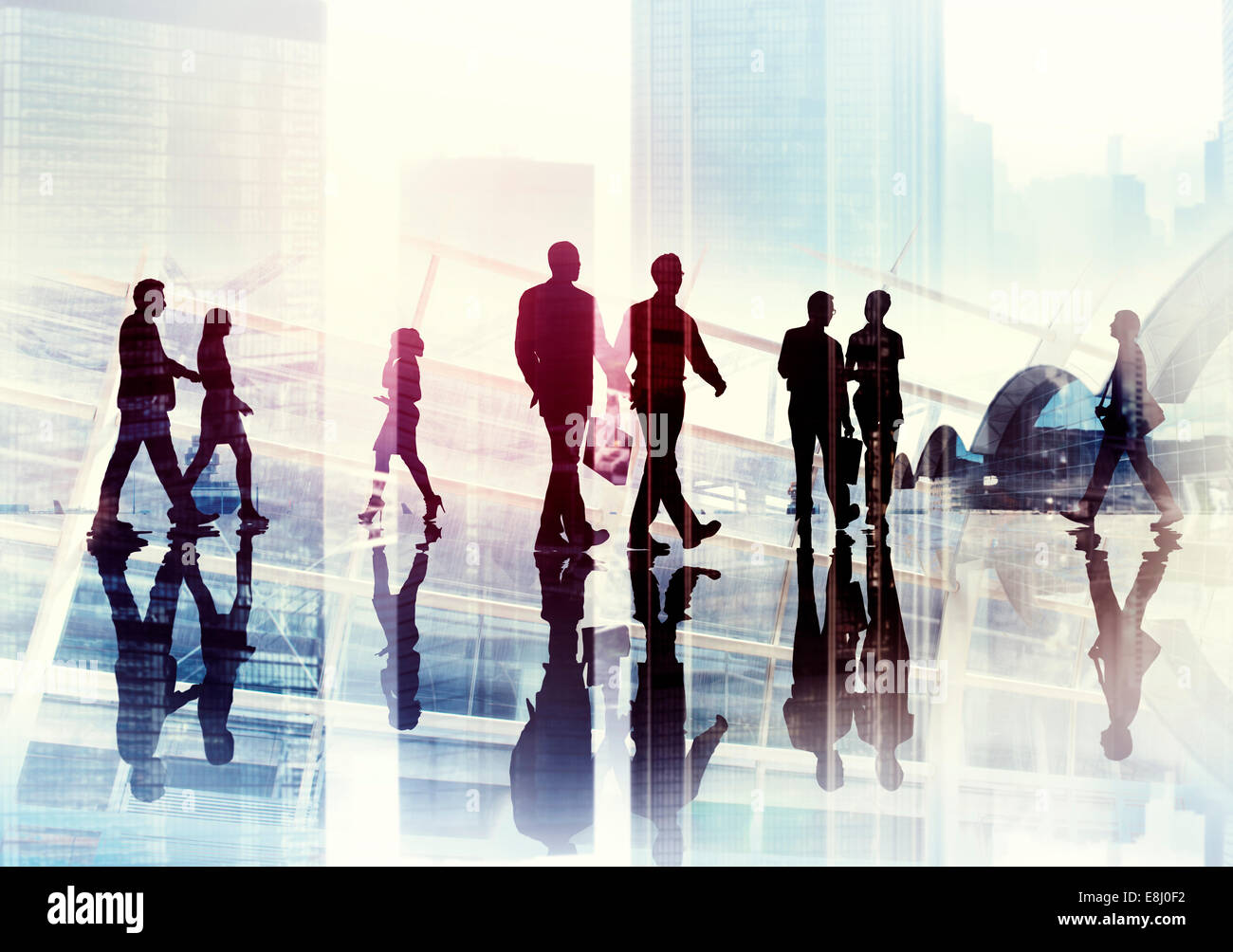 Silhouettes of Business People Walking inside the Office Stock Photo ...