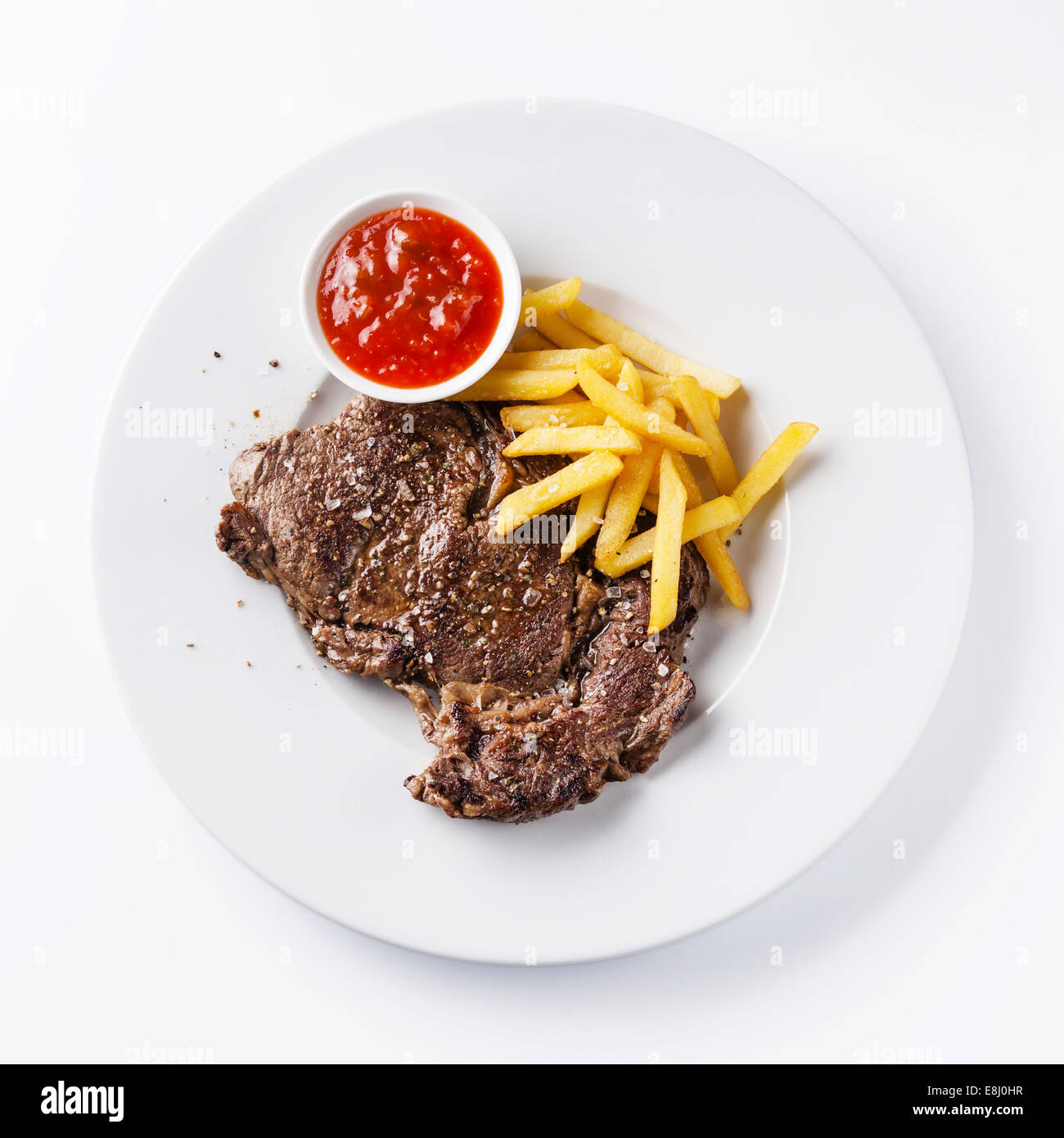 Roast beef with Salted french fries on white plate on white background