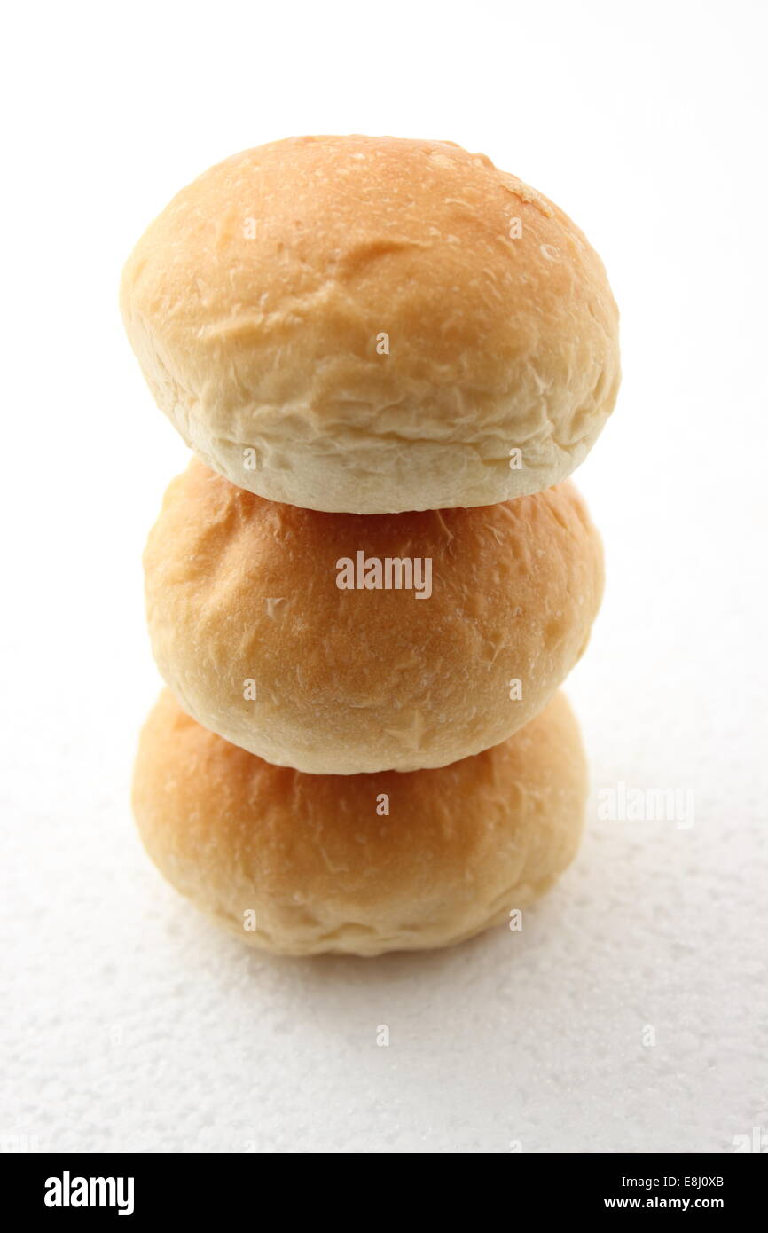Soft white bread roll on white background Stock Photo Alamy