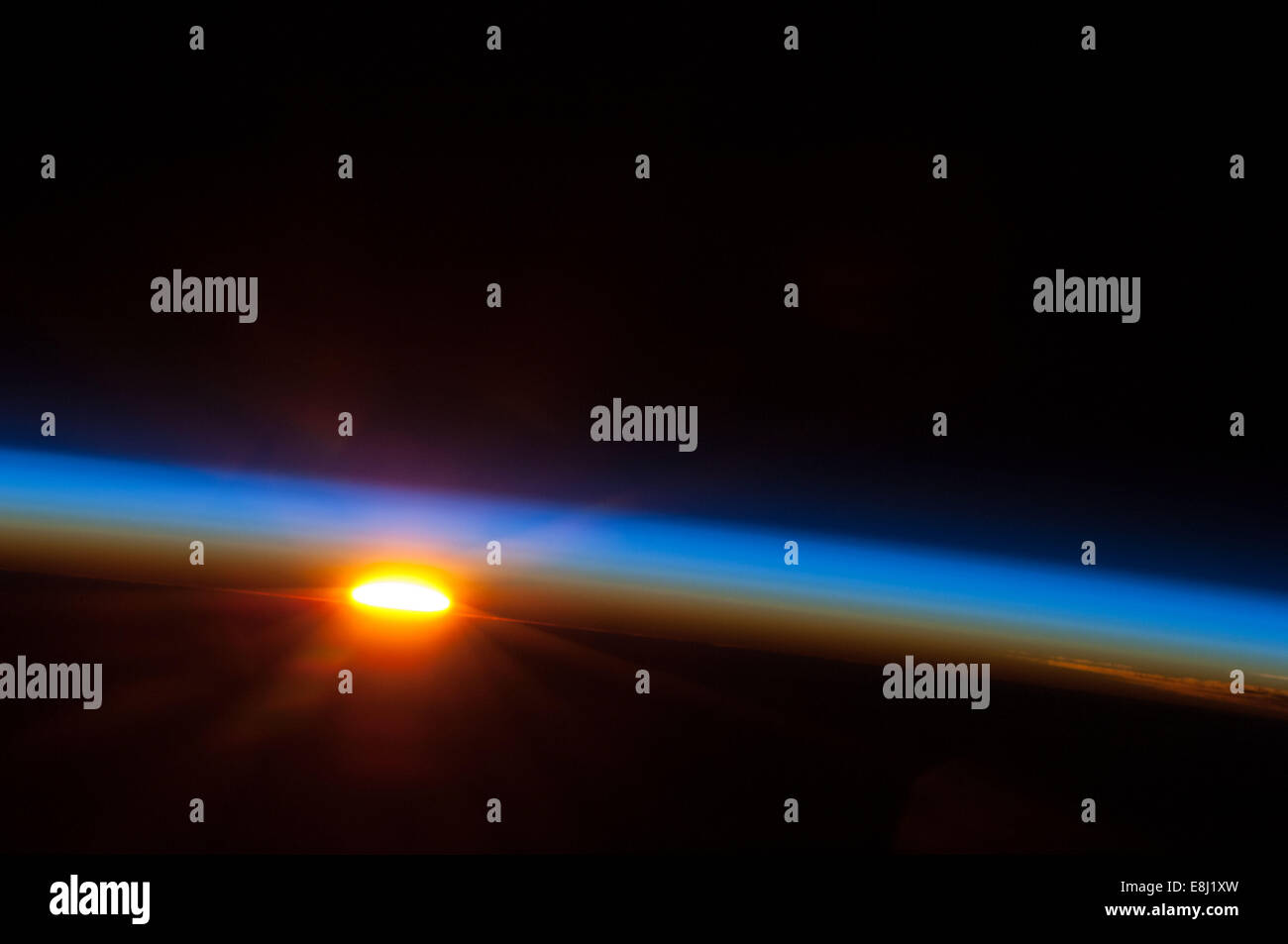 A beautiful sunrise over the South Pacific Ocean is captured by a ...