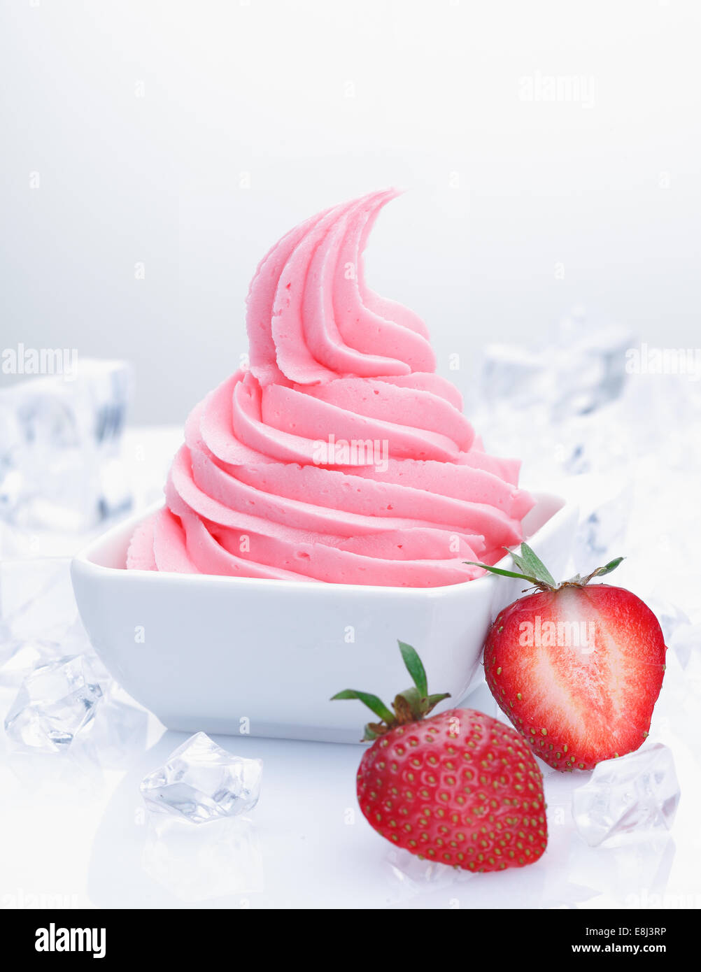 Frozen strawberry yogurt with with fresh fruits and flavored creamy