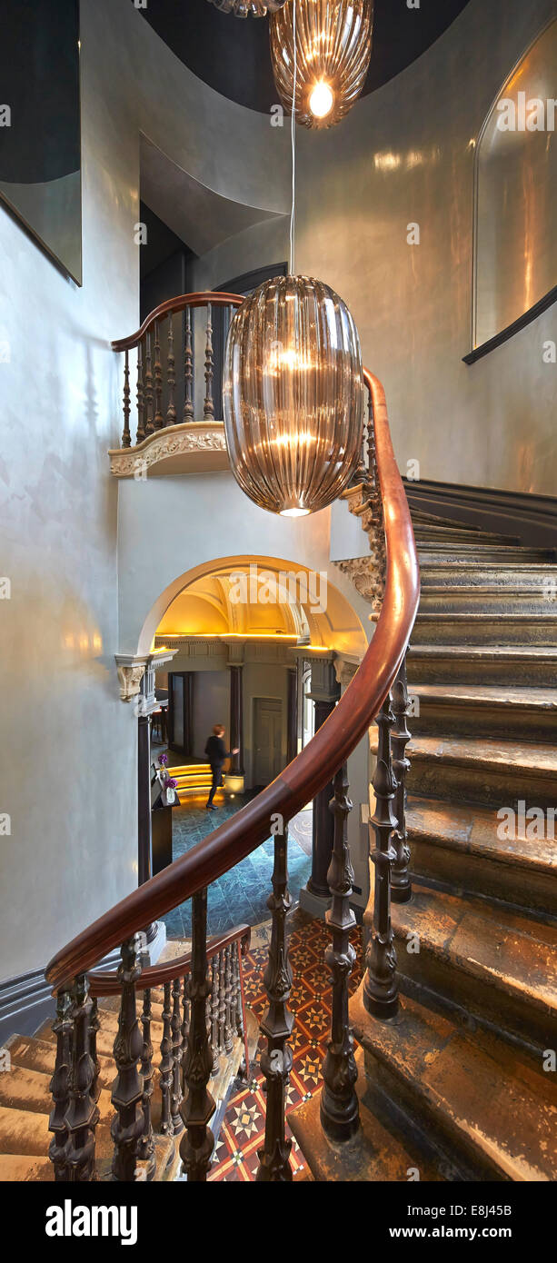 Christopher's, London, United Kingdom. Architect: De Matos Ryan, 2013. Decorative distressed stairwell. Stock Photo