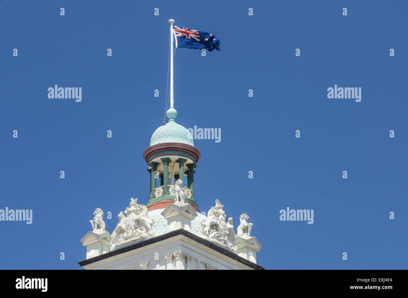 Station tower with New Zealand flag, Dunedin, South Island, New Zealand Stock Photo