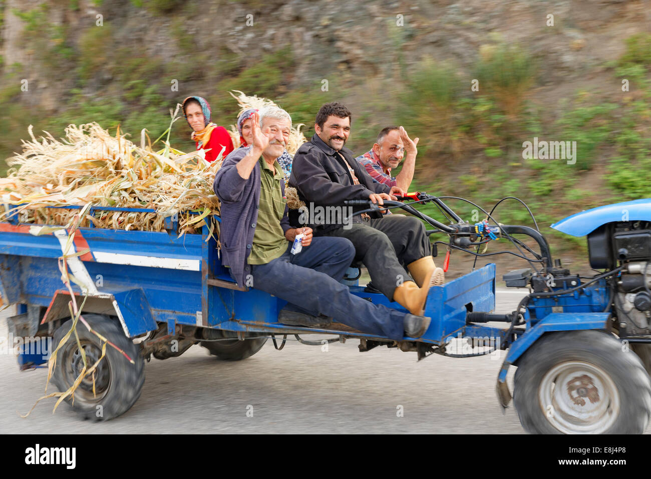 Farmers travelling on a tractor, Küre Mountains, near Cide, Kastamonu Province, Black Sea Region, Turkey Stock Photo