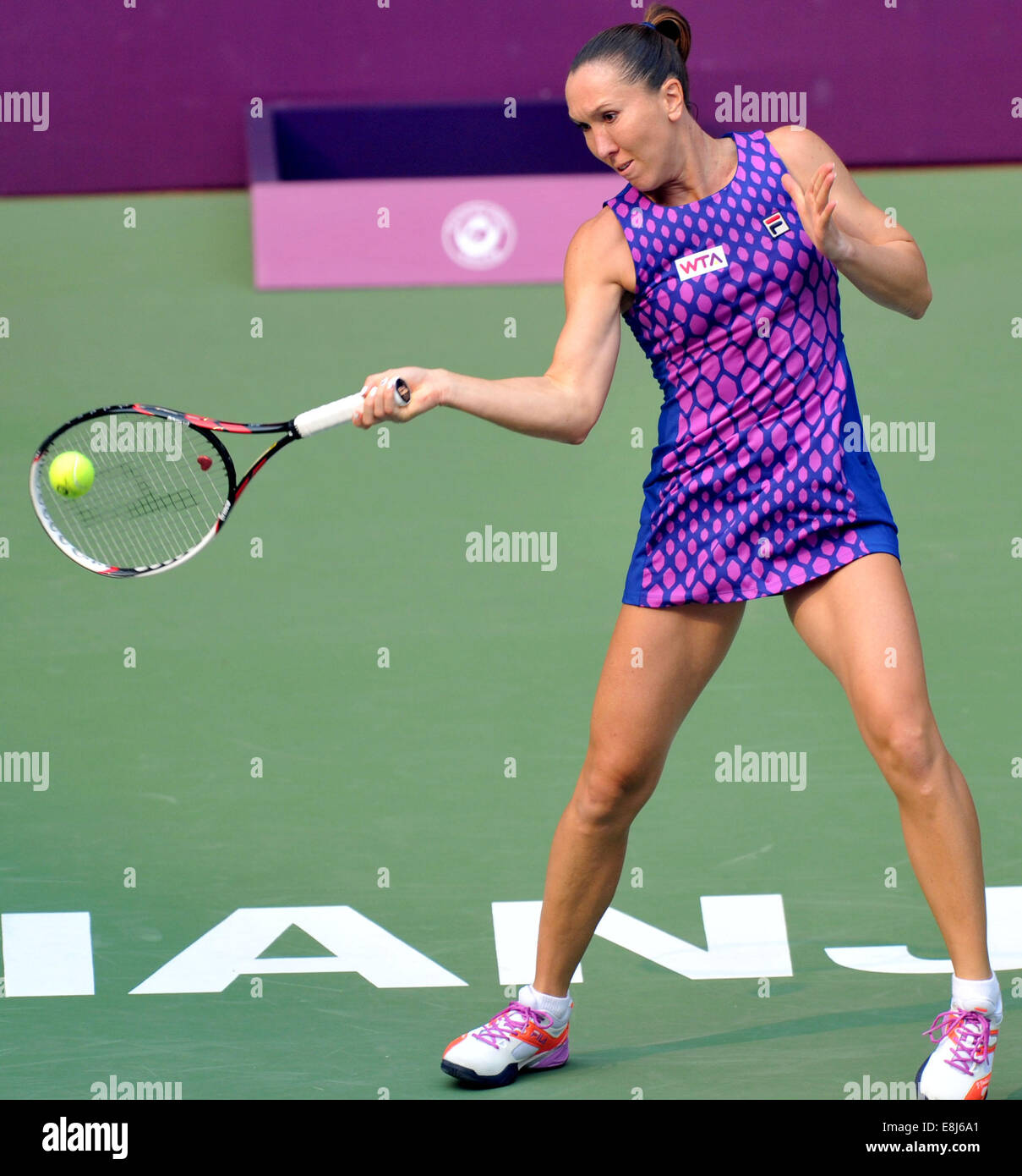 Tianjin, China. 9th Oct, 2014. Serbia's Jelena Jankovic returns a shot  during the women's singles 2nd round match against China's Zheng Saisai at  the 2014 Tianjin Open tennis tournament in Tianjin, north