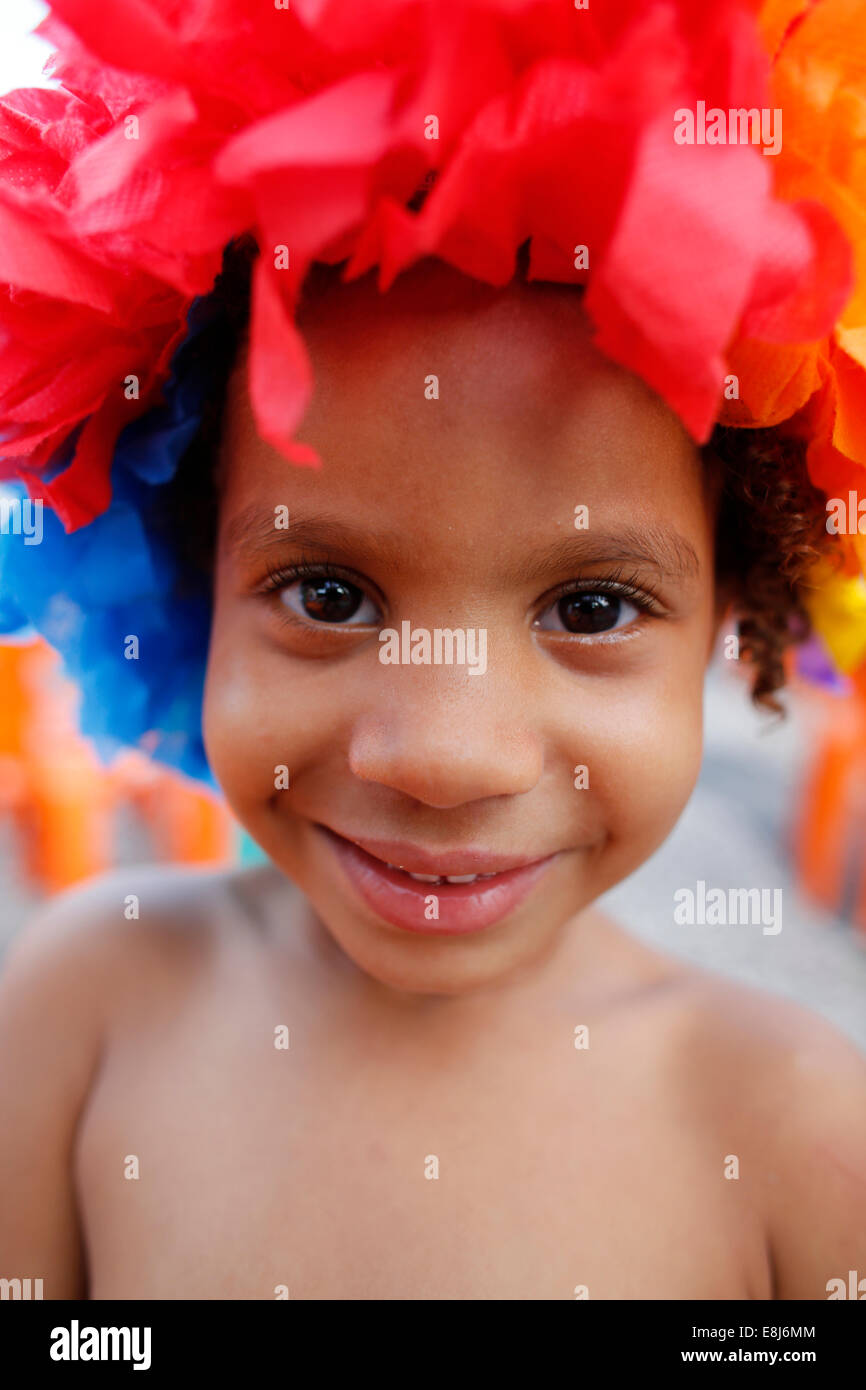 Child enjoying the Salvador street carnival in Pelourinho Stock Photo