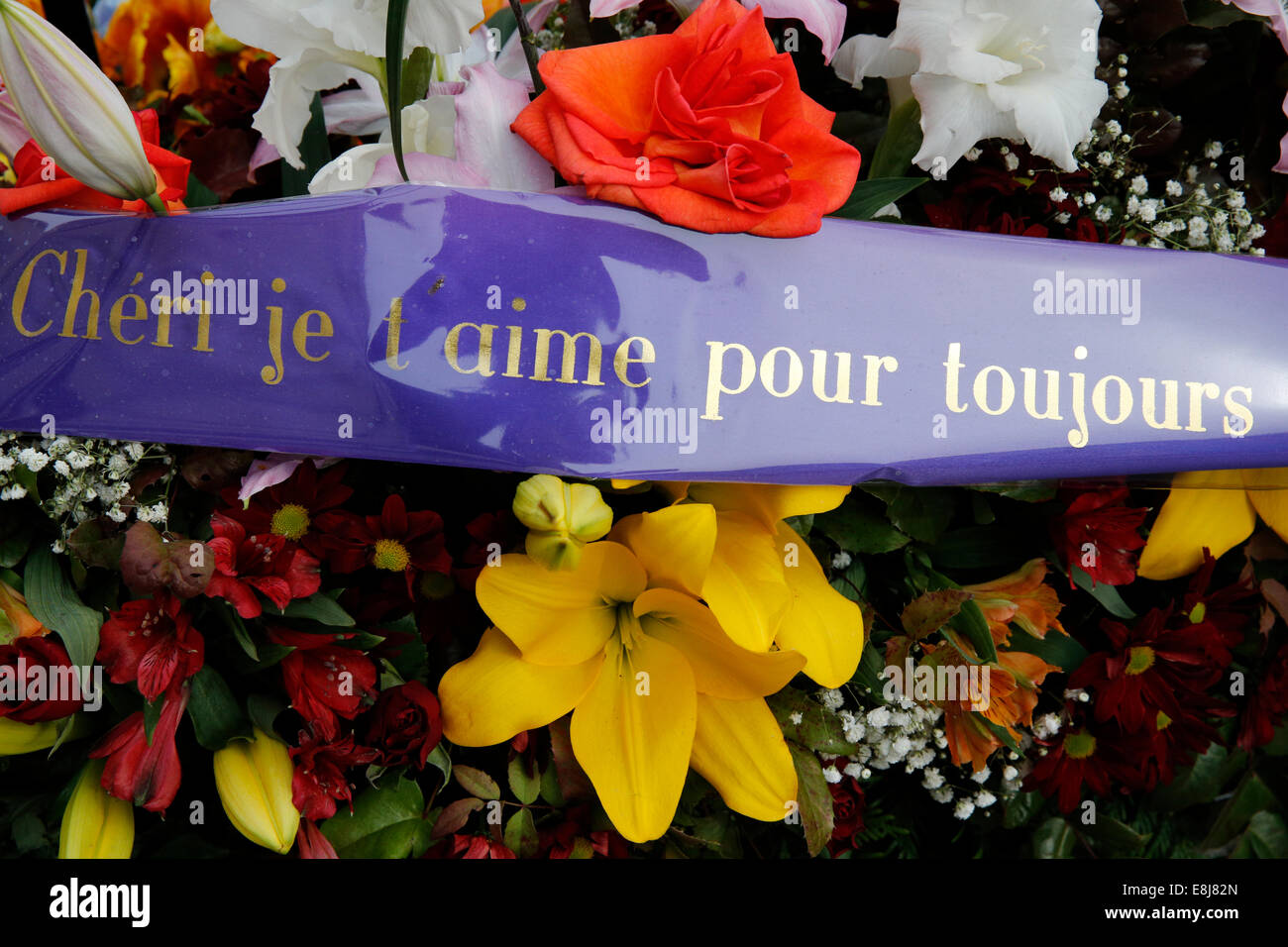 Pre Lachaise Cemetery. Wreath with a ribbon: ChŽri je t'aime pour toujours (Darling, I love you for ever). Stock Photo
