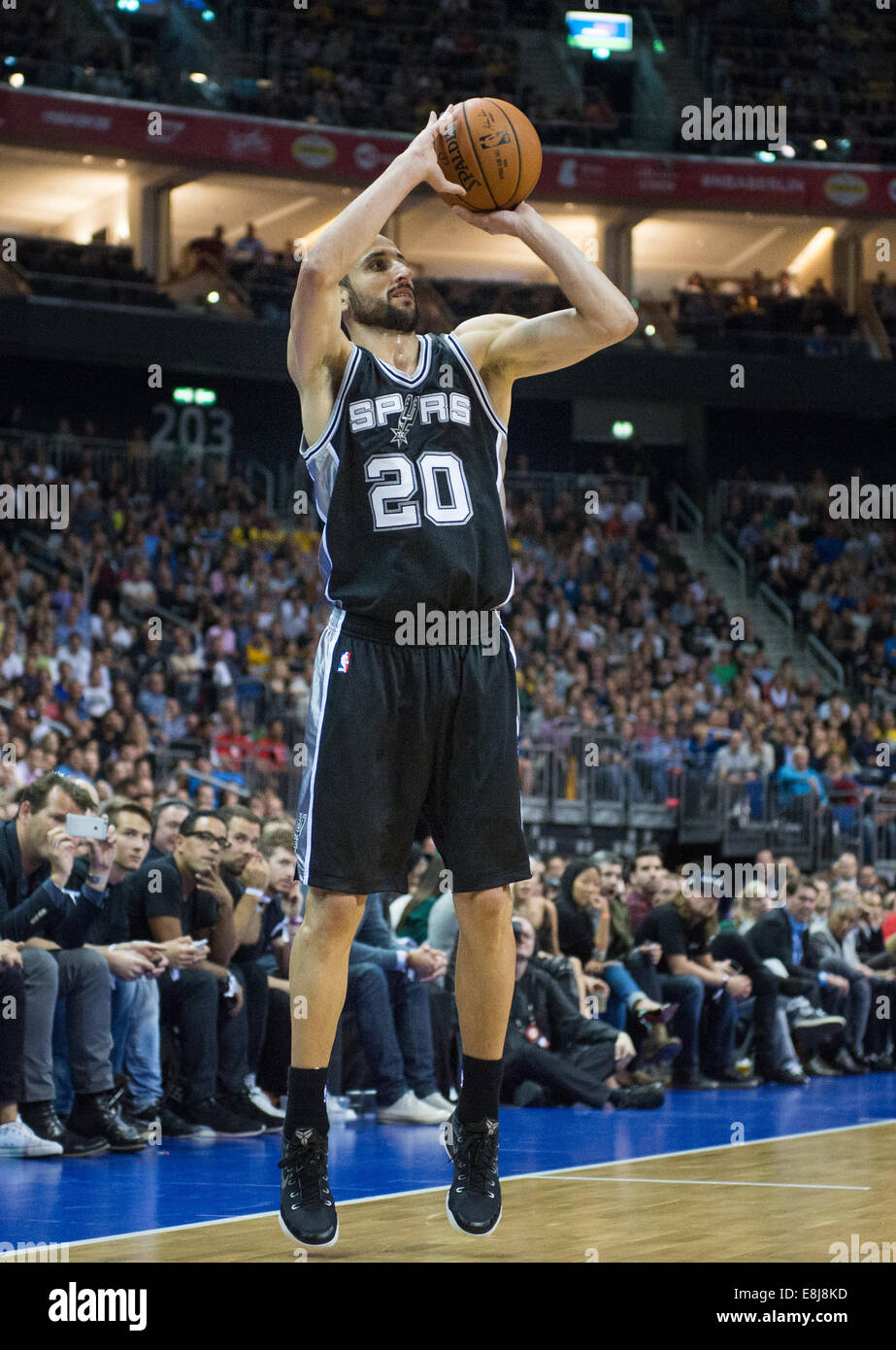 Berlin, Germany. 08th Oct, 2014. San Antonio's Manu Ginobili in action during the basketball game between Alba Berlin and the San Antonio Spurs as part of the 'NBA Global Games' in Berlin, Germany, 08 October 2014. Photo: LUKAS SCHULZE/dpa/Alamy Live News Stock Photo