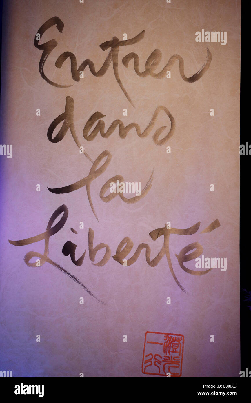 Banner with a Buddhist calligraphy - Enter Freedom Stock Photo