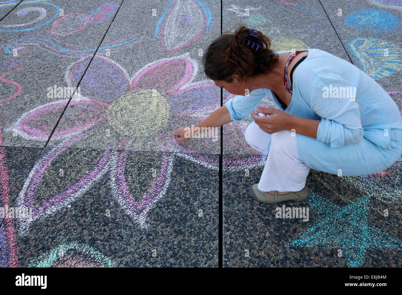 Woman drawing with chalk Stock Photo Alamy