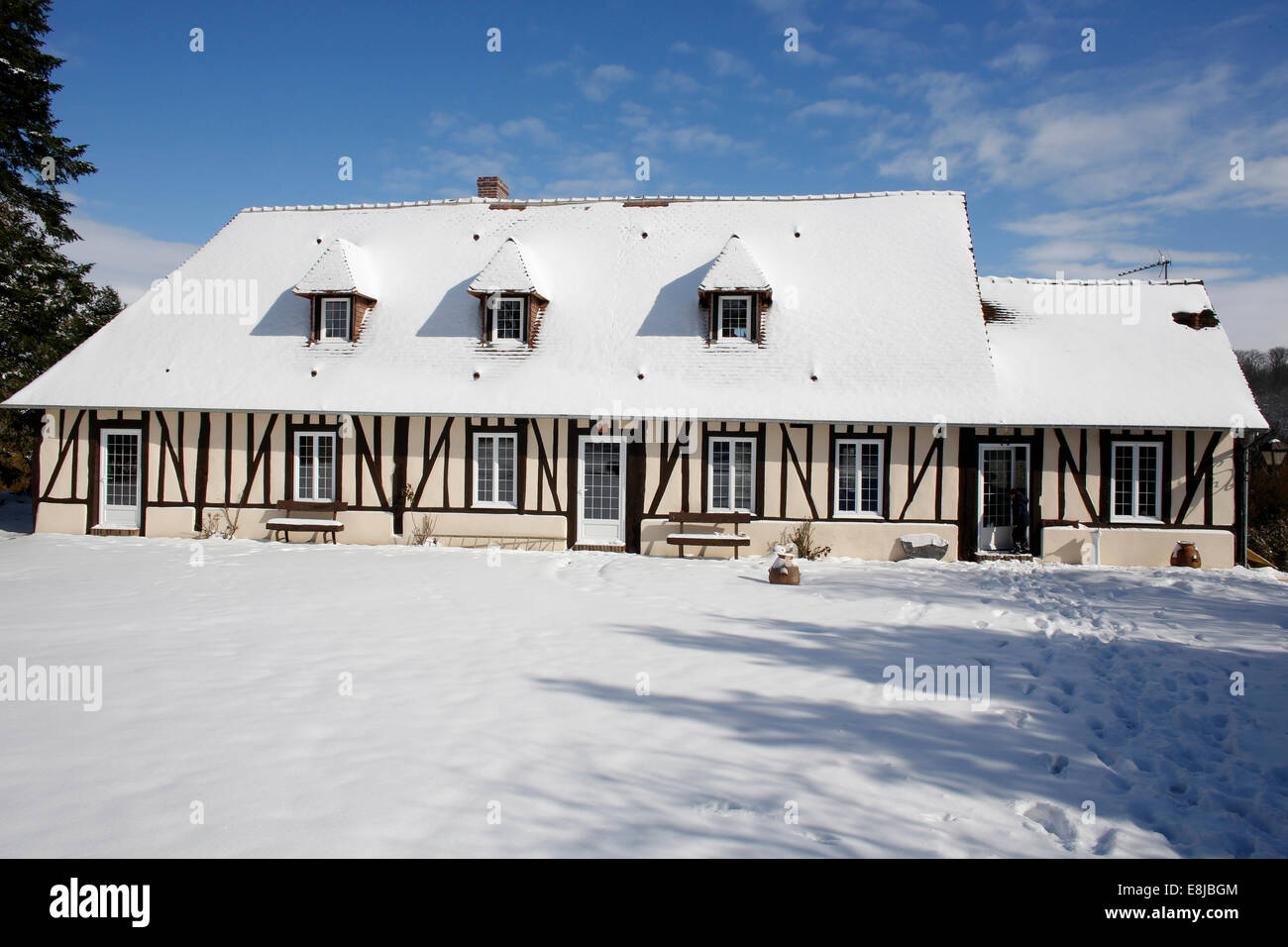 Typical Normandie House covered with snow (property release available) Stock Photo