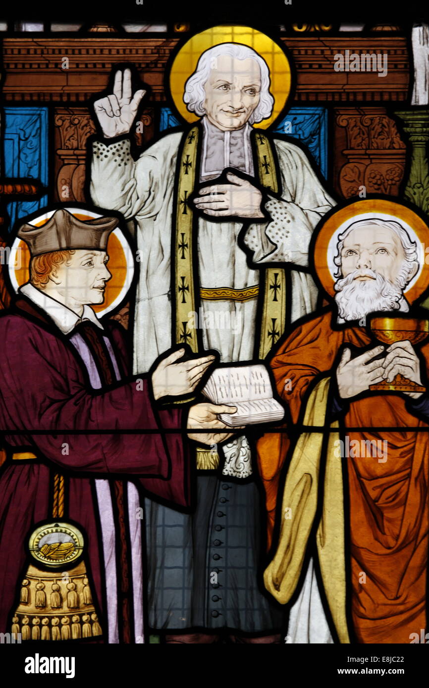 Stained glass in Saint-HonorŽ d'Eylau church : Saint Jean Vianney, holy priest of Ars Stock Photo