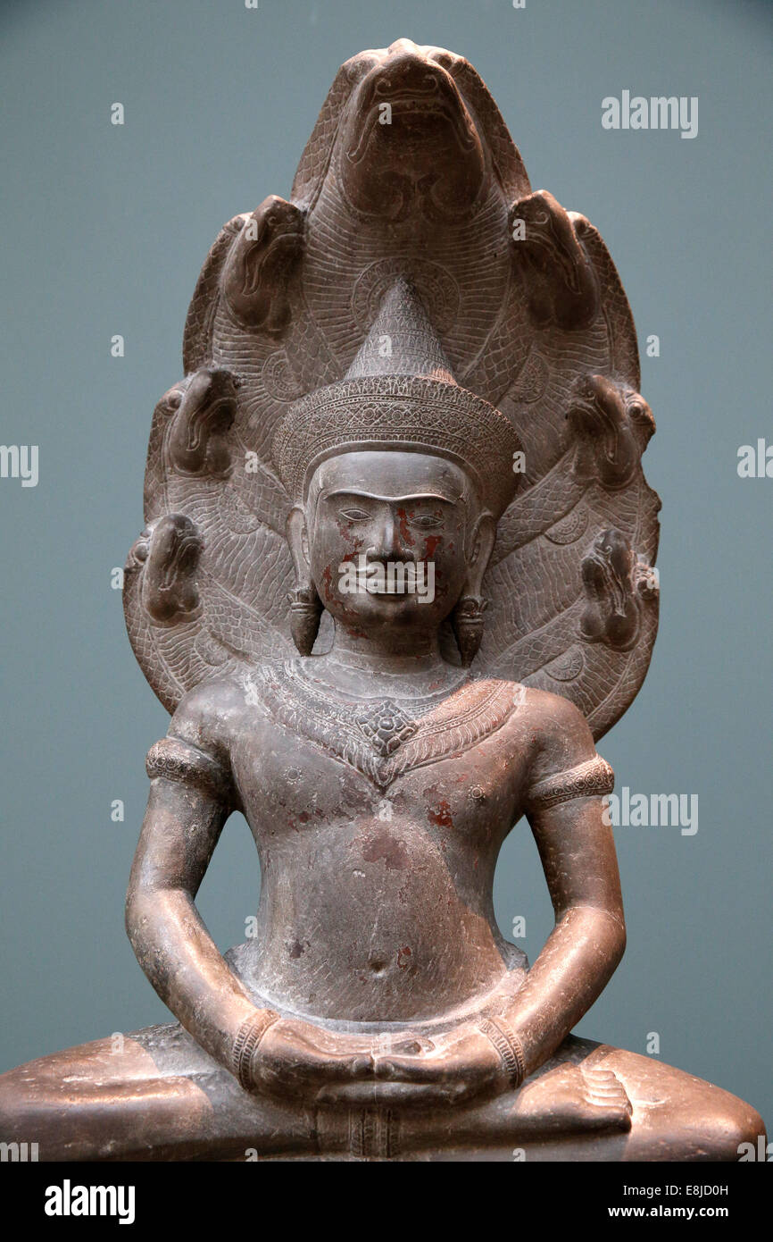 Buddha protected by the Naga. MusŽe Guimet. Museum of Asian Arts. Paris. Exhibition: Angkor Birth of a Myth. Louis Delaporte and Stock Photo
