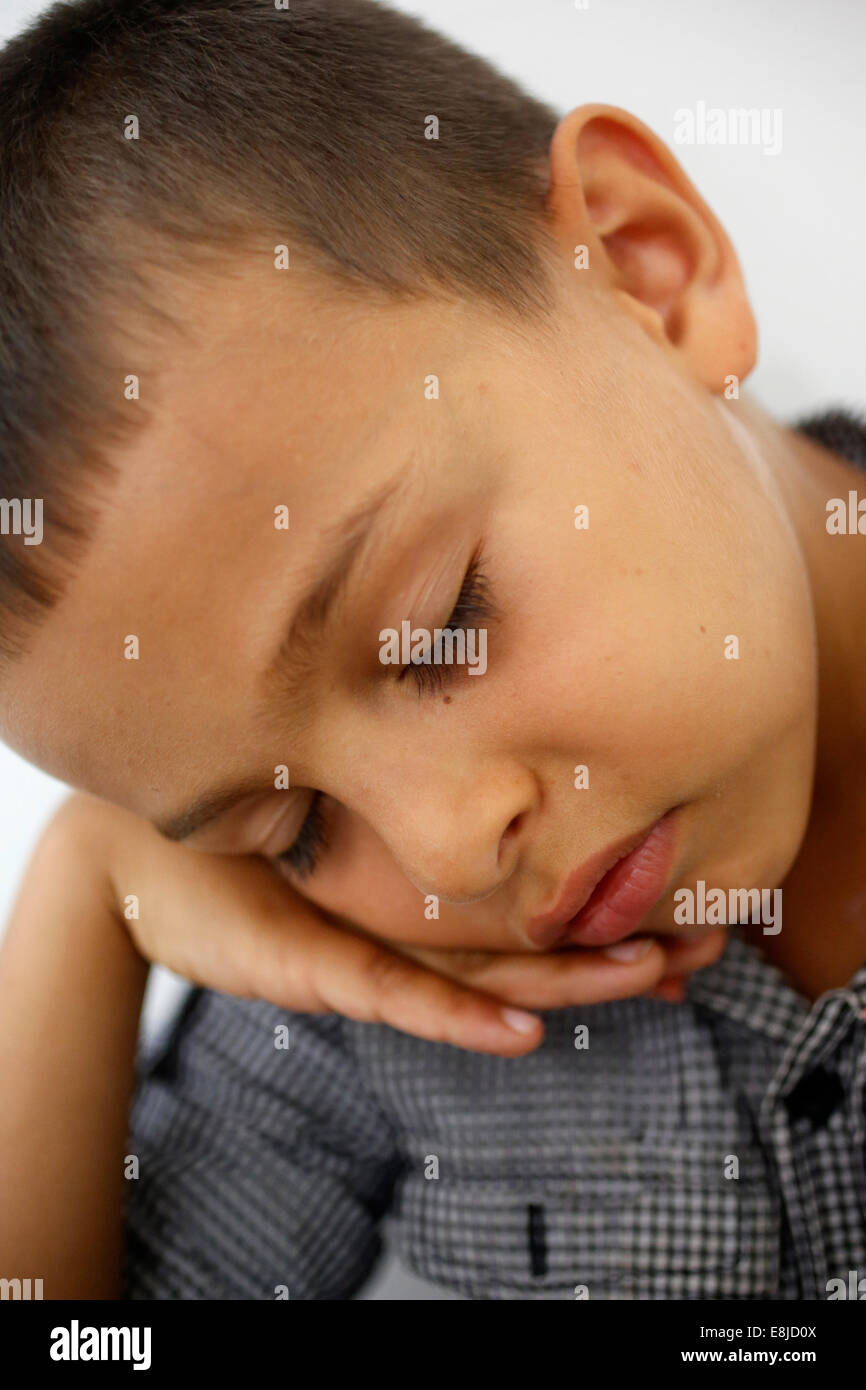 6-year-old boy falling asleep Stock Photo