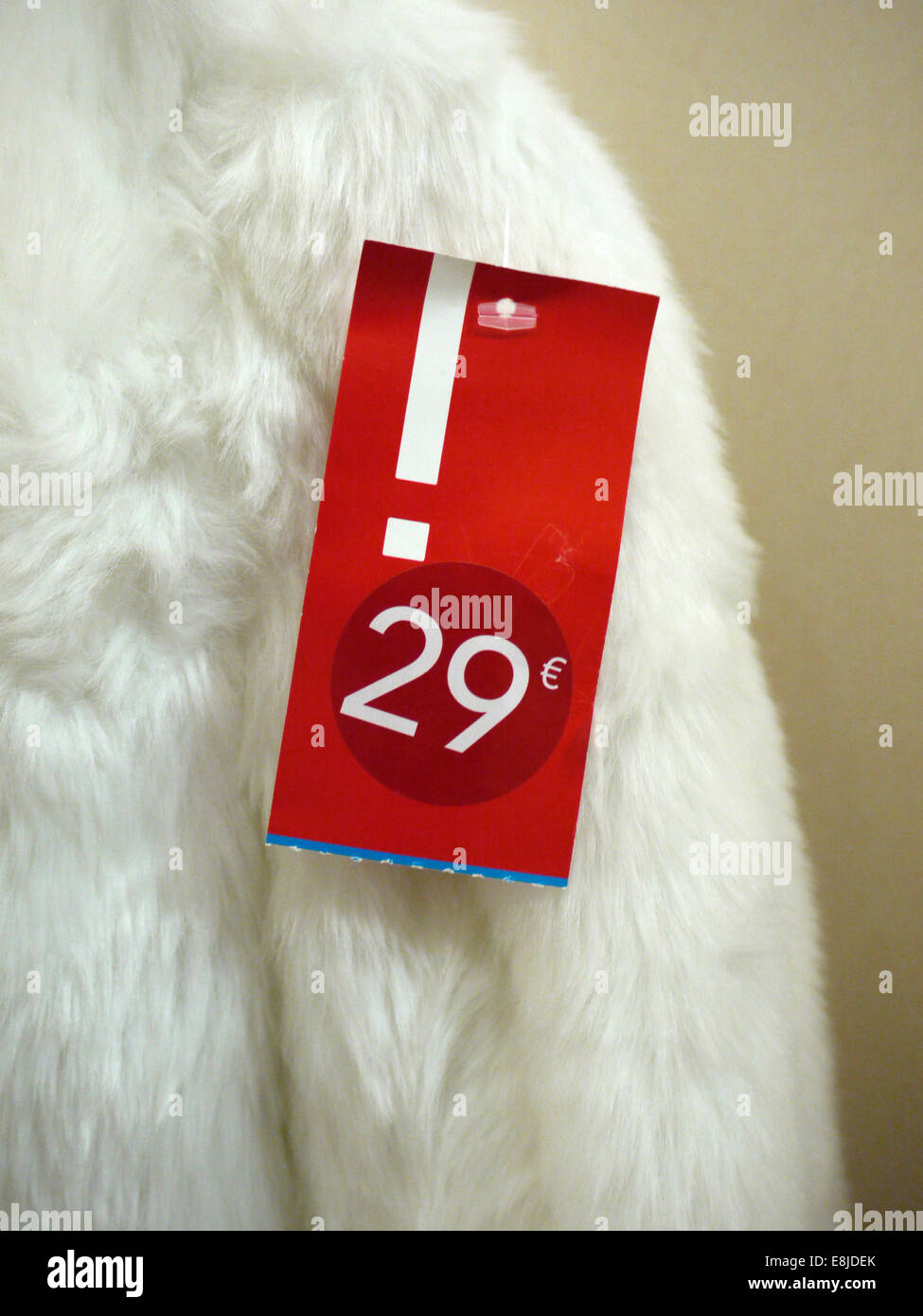 Price tag on an false fur coat Stock Photo Alamy