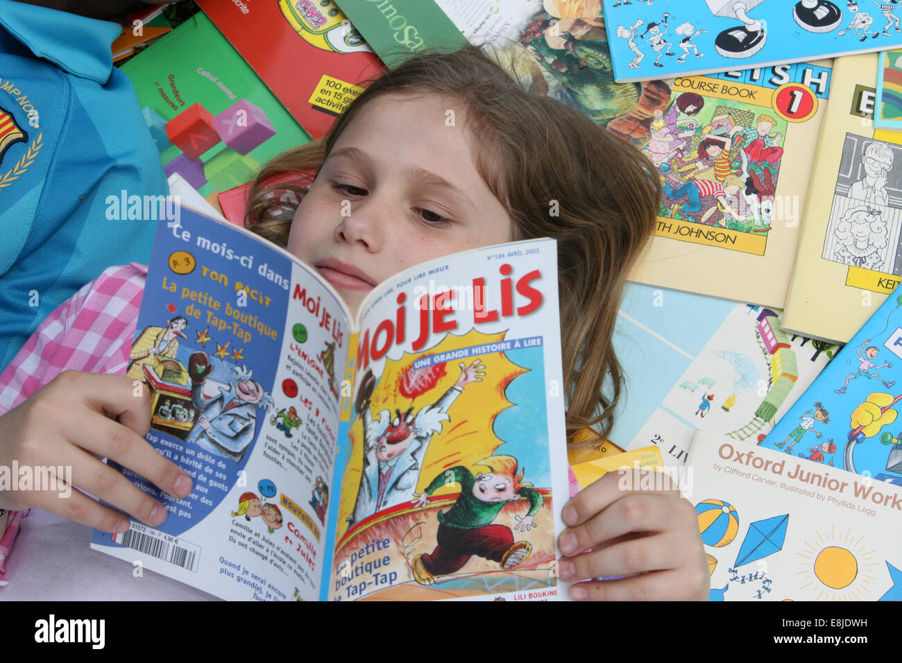 Girl reading a book. Stock Photo