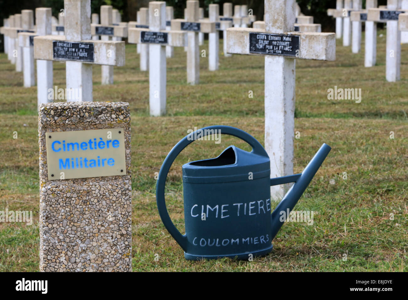 Watering can. Commonweatlth war Graves. French military cemetery containing the graves of 328 ColumŽriens, English, Dutch and Af Stock Photo