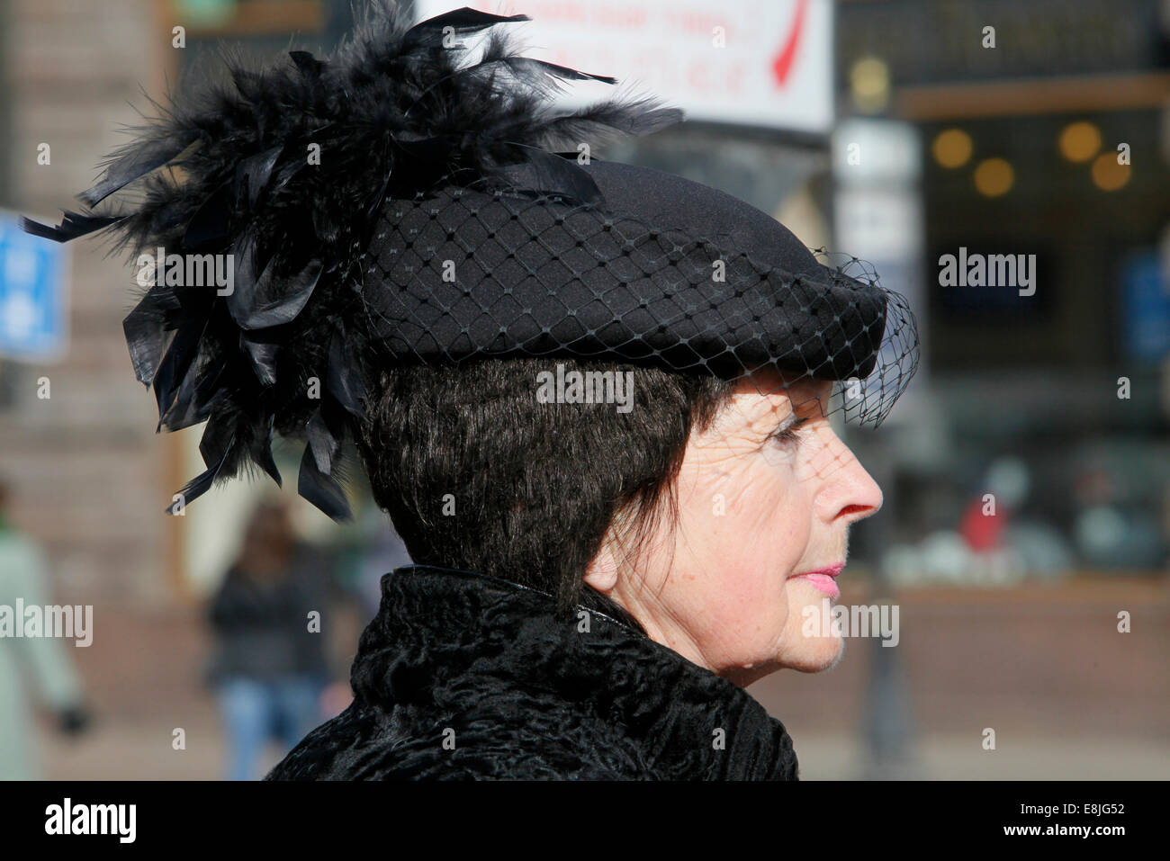 Hat wearing woman hi-res stock photography and images - Alamy