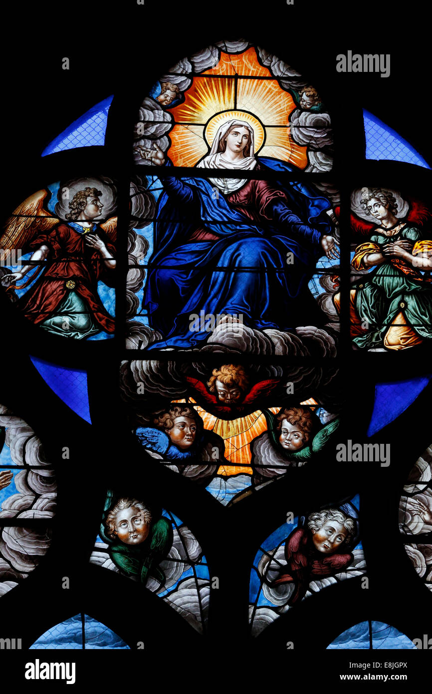 Stained-glass window. The Assumption of the Blessed Virgin Mary into Heaven. Stock Photo