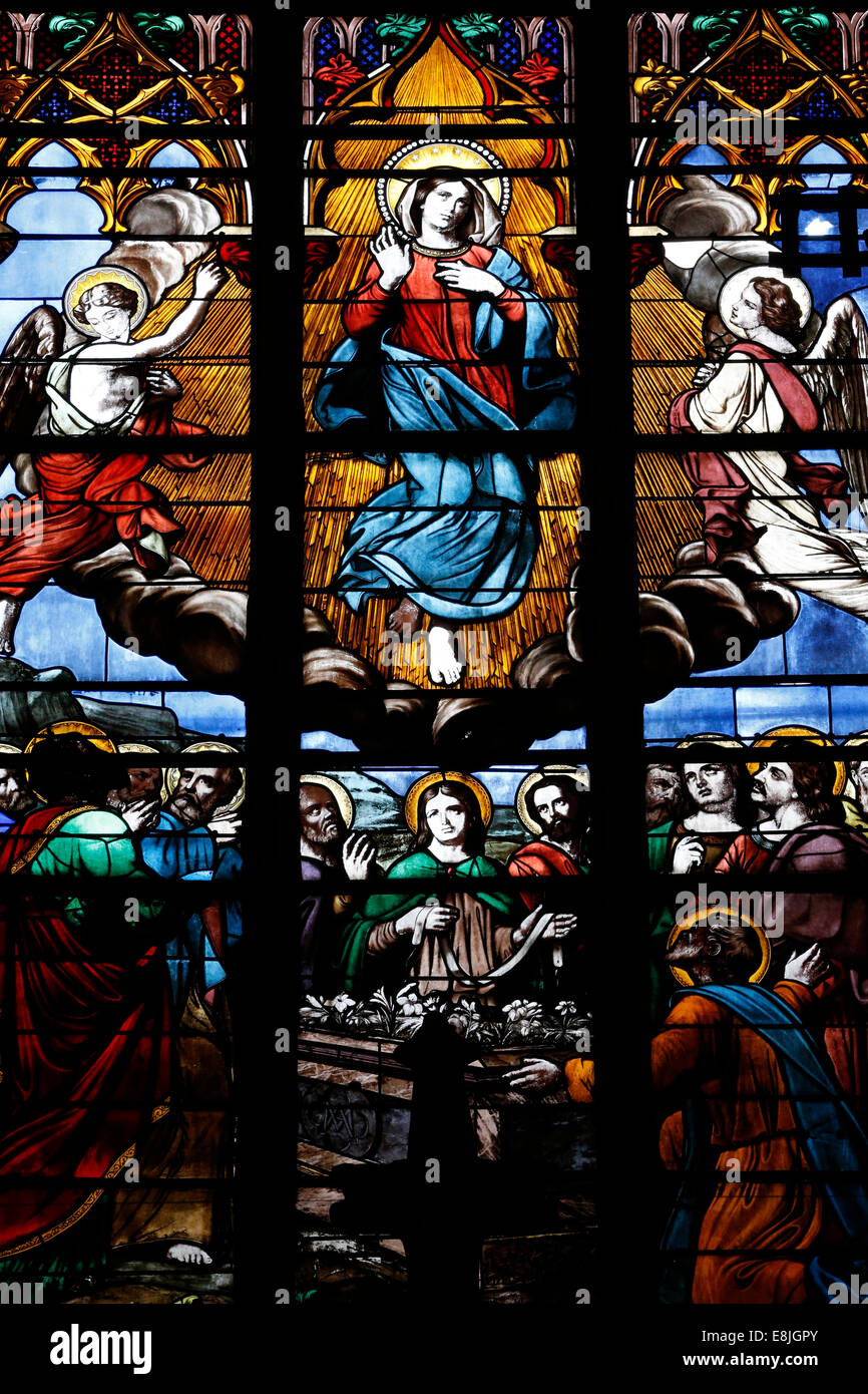 Stained-glass window. The Assumption of the Blessed Virgin Mary into Heaven. Stock Photo