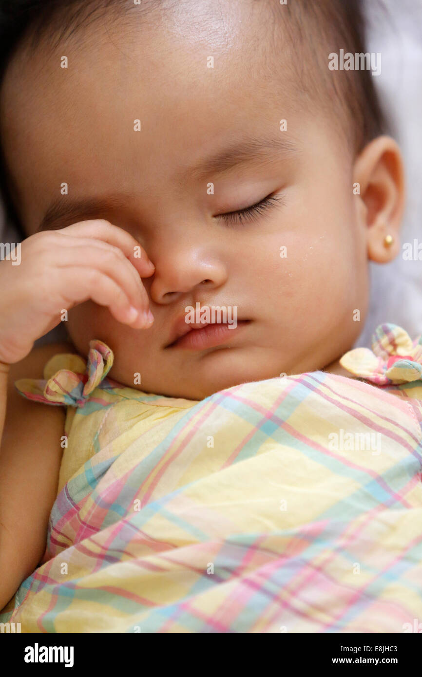 Baby girl sleeping hi-res stock photography and images - Alamy