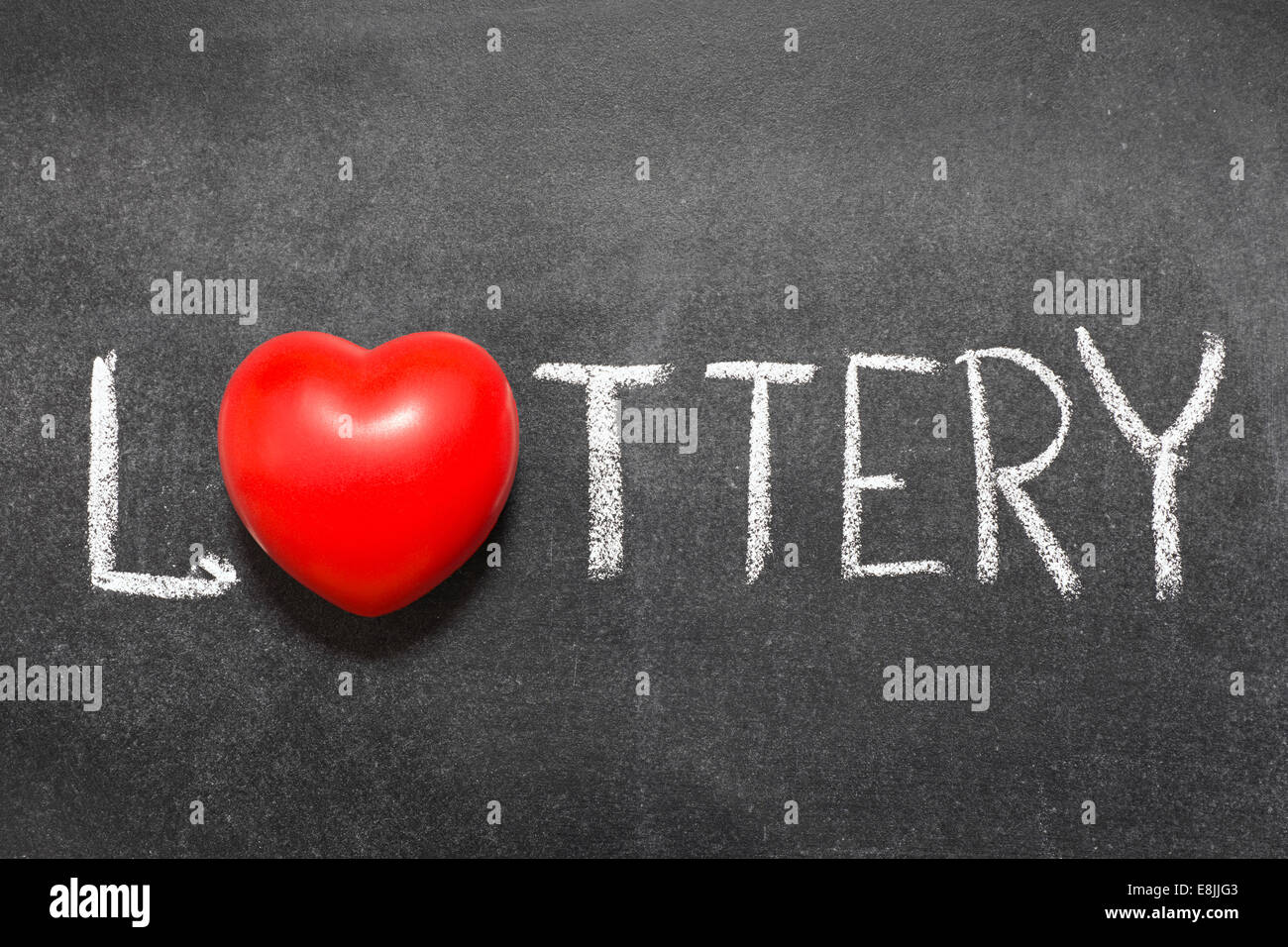 lottery word handwritten on blackboard with heart symbol instead of O Stock Photo