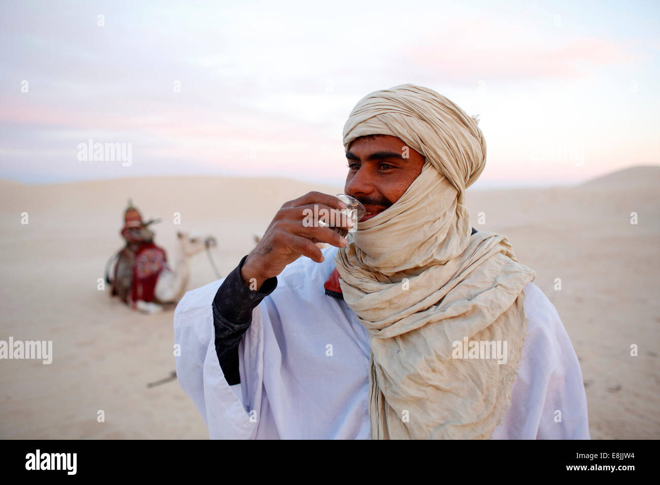 Beduin drinking tea in the Sahara Stock Photo Alamy