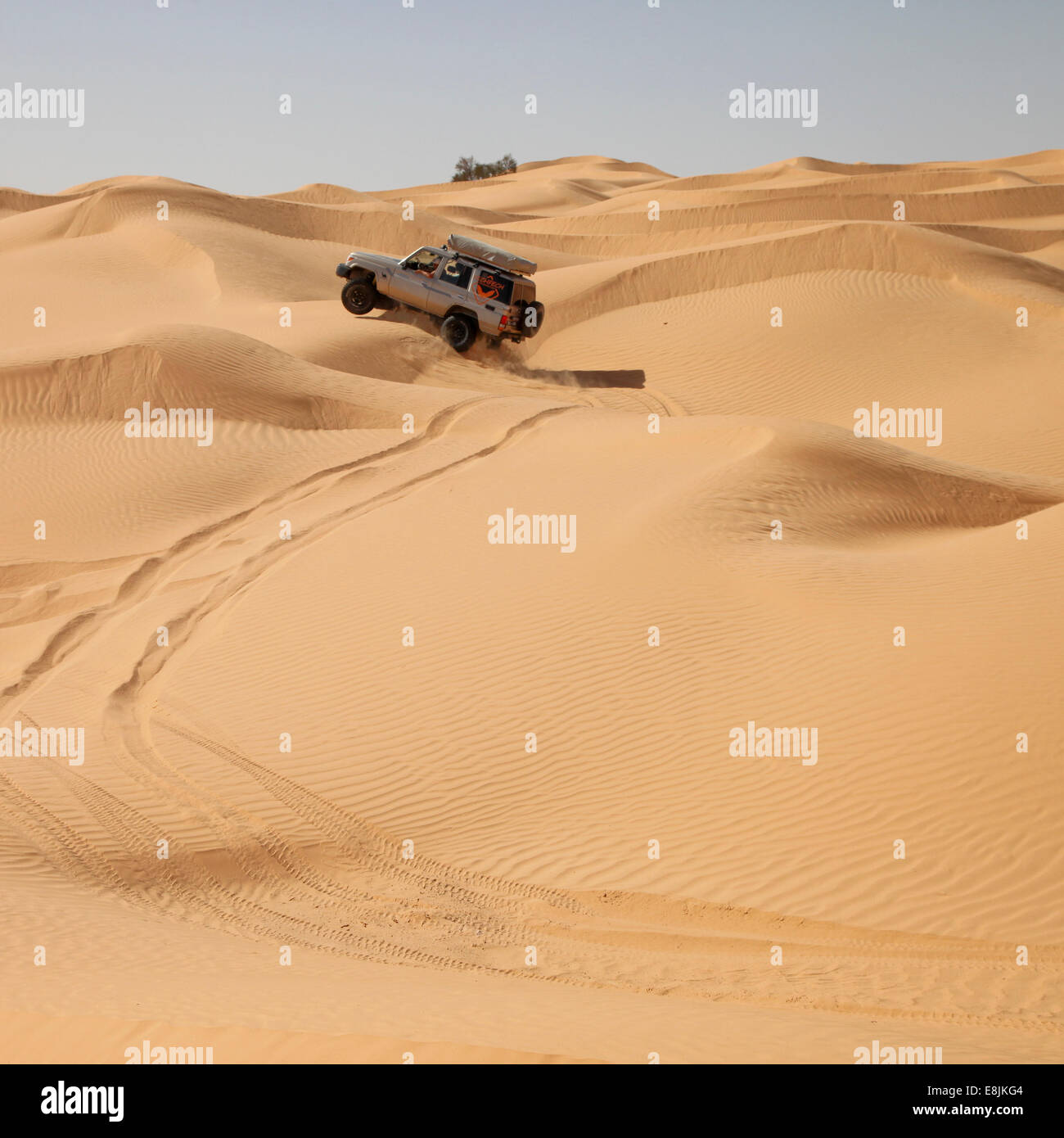 Vehicle in the desert. Stock Photo