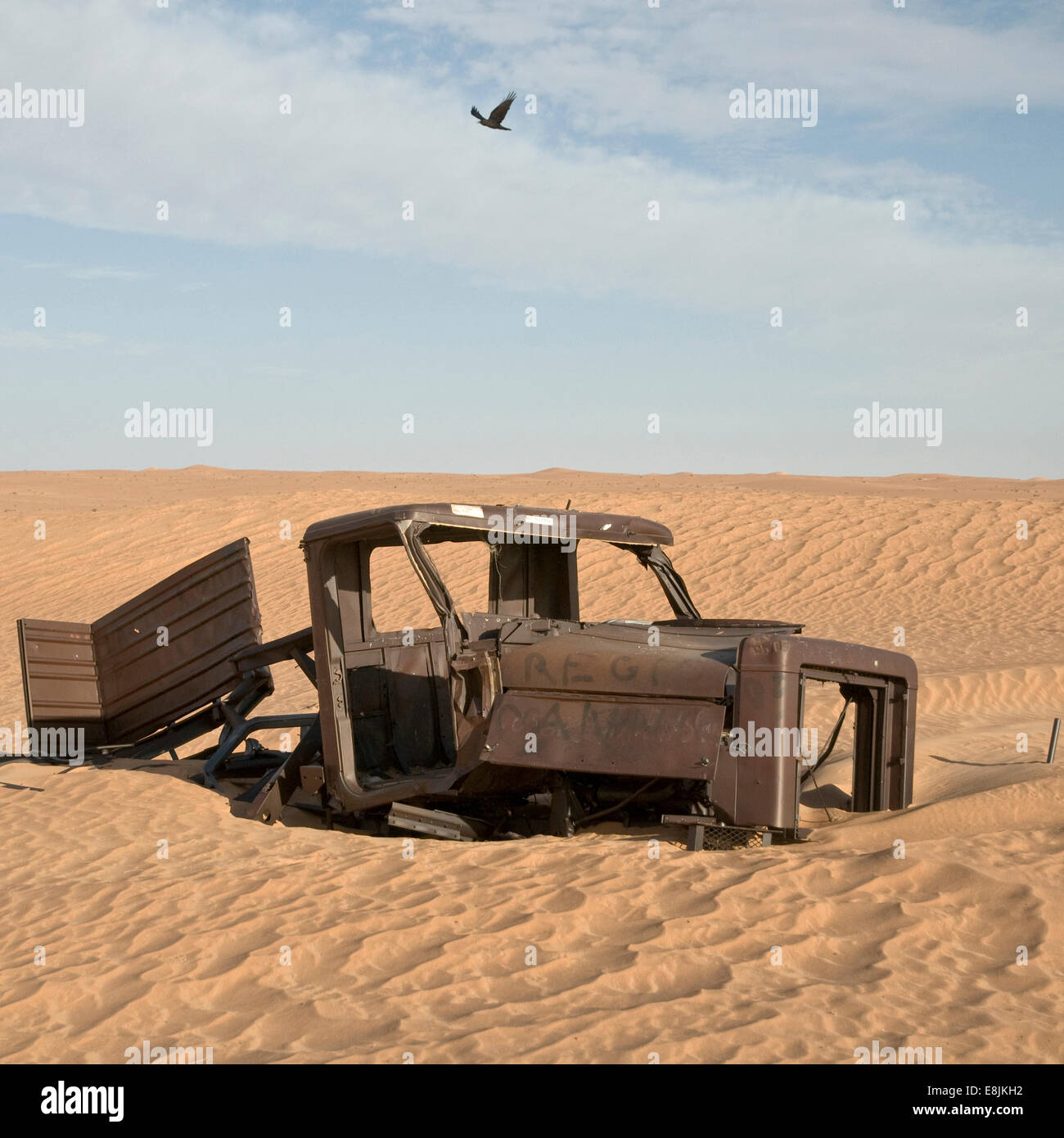 Rusty vehicle in the Sahara Stock Photo