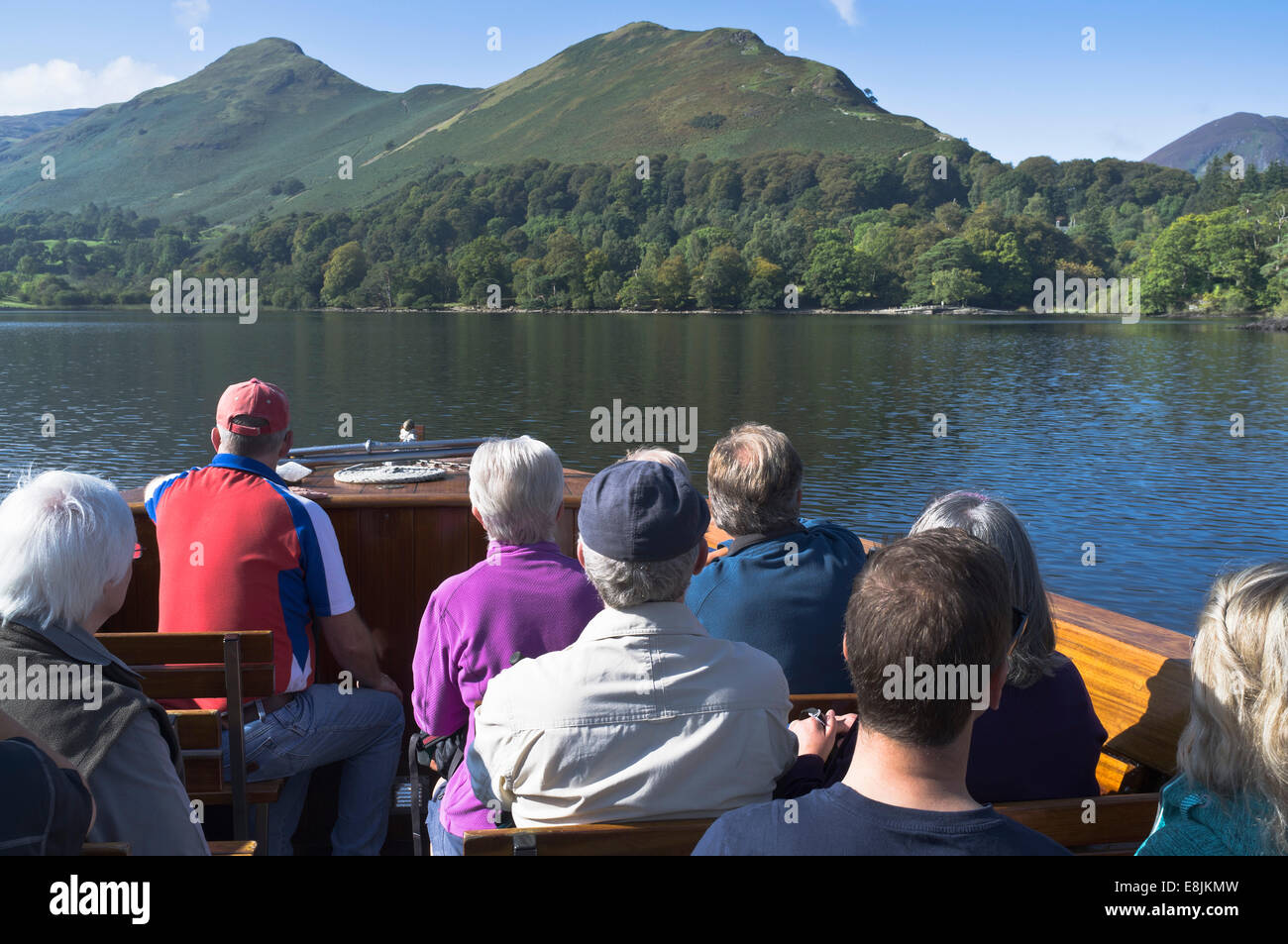 dh Derwent Water KESWICK LAKE DISTRICT Tourists on lake water taxi ferry viewing Cat Bells hills holiday boat Stock Photo