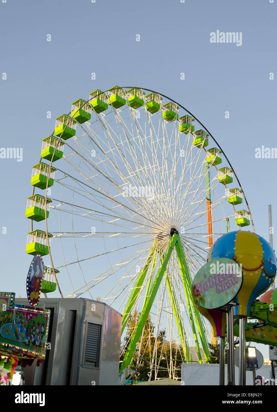 Old Ferris wheel on annual fair. funfair. Spain. Stock Photo