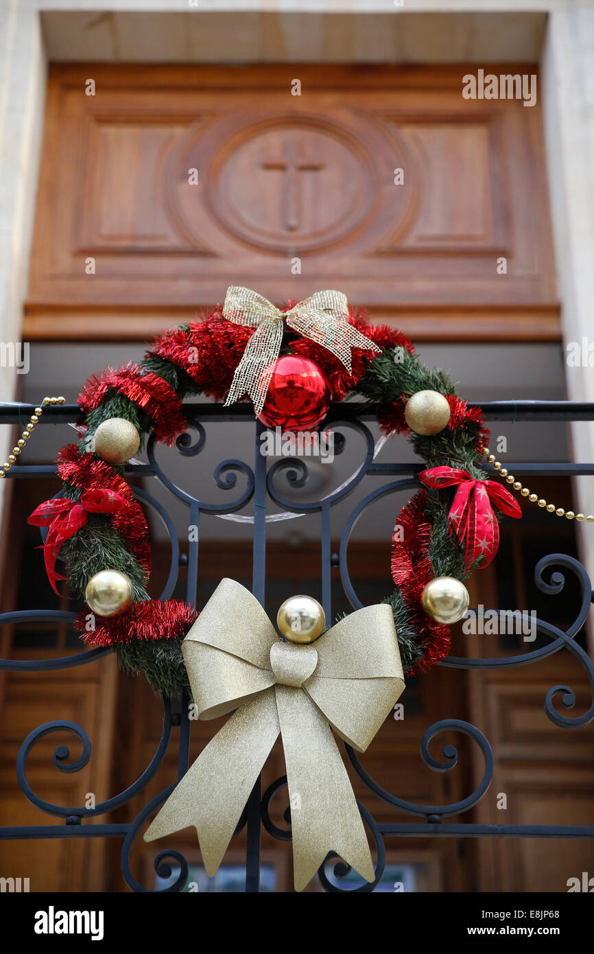 Christmas Wreath At The Entrance Of A Church Stock Photo 74171280