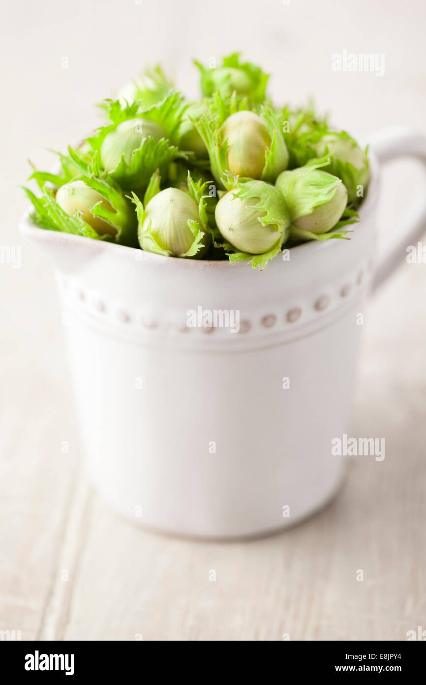 Homegrown Cobnuts in Jug Stock Photo
