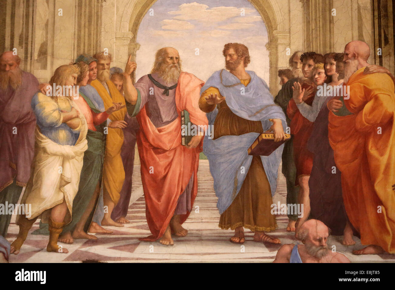 The School of Athens. Detail of a mural by Raphael painted for Pope Julius II - In the center Plato (Leonardo da Vinci) discours Stock Photo