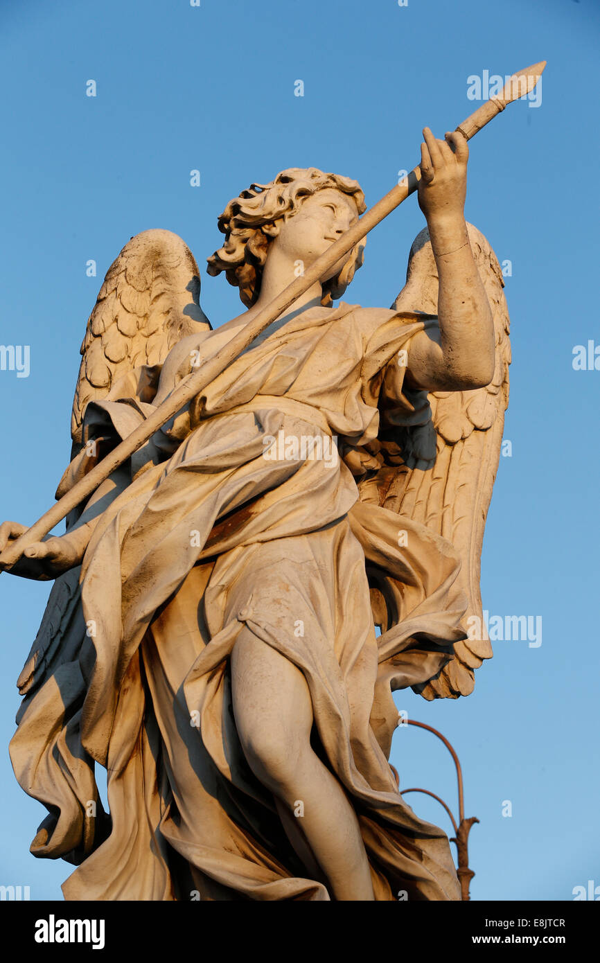 Angel statue on Ponte Sant'Angelo with the lance that pierced the side of Christ. Le Bernin. Stock Photo