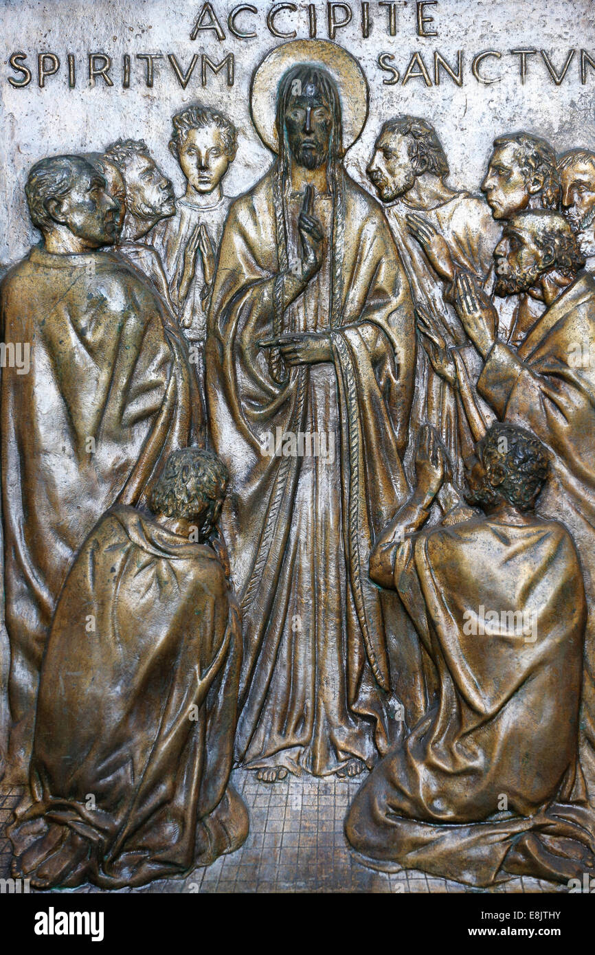 ChristÕs Appearance to the Disciples. The Holy door of St. Peter's Basilica.  Cast in bronze by Vico Consorti (1949). Stock Photo