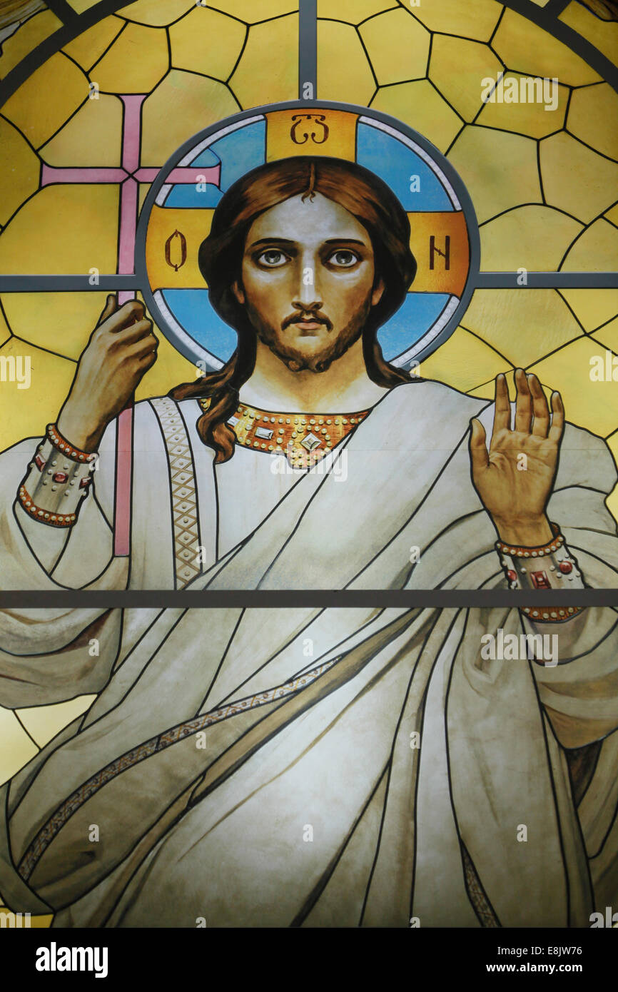 St. Peter and St. Paul Cathedral. Stained glass window of Jesus. Stock Photo