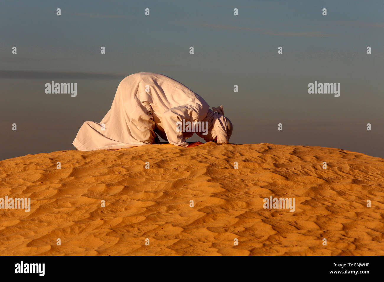 Praying In Desert Man Prayer High Resolution Stock Photography and Images -  Alamy