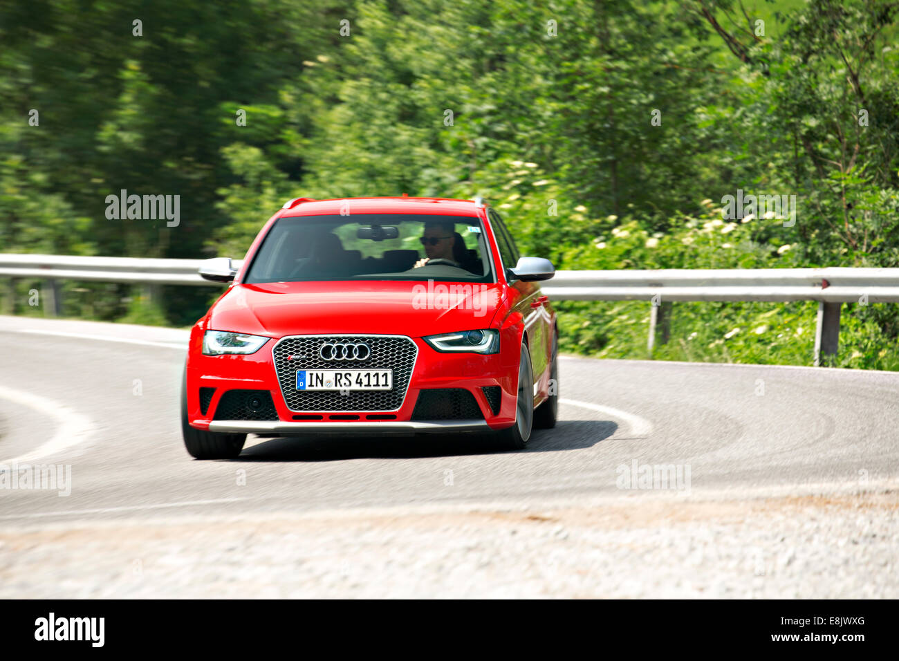 Audi RS4 2012 red driving Stock Photo