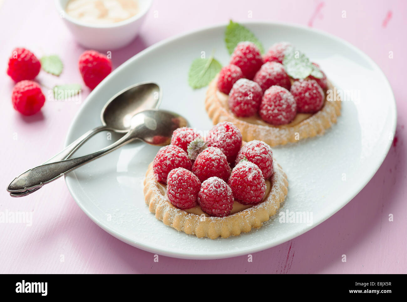 Tartlet with fresh raspberries Stock Photo