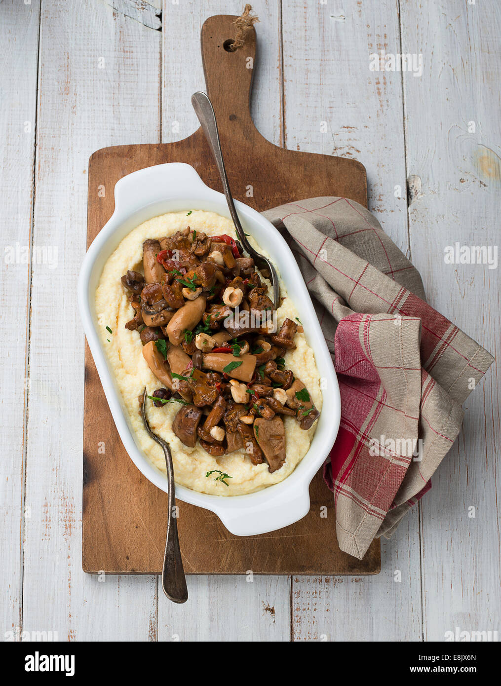 Polenta with mushrooms and onion Stock Photo