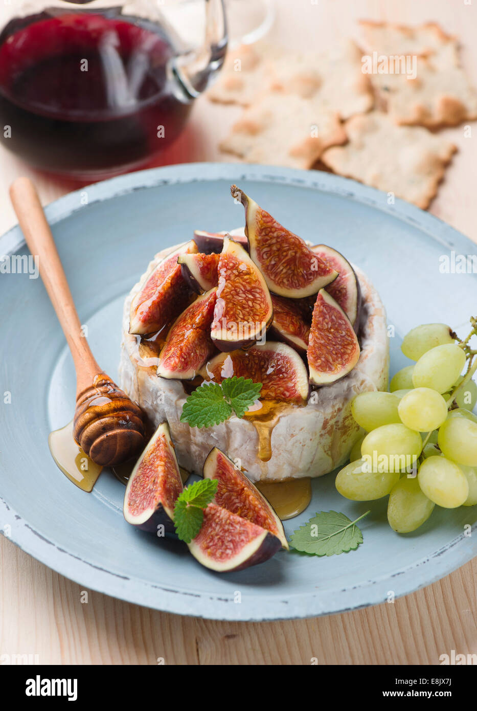 Figs, honey and camembert cheese Stock Photo Alamy